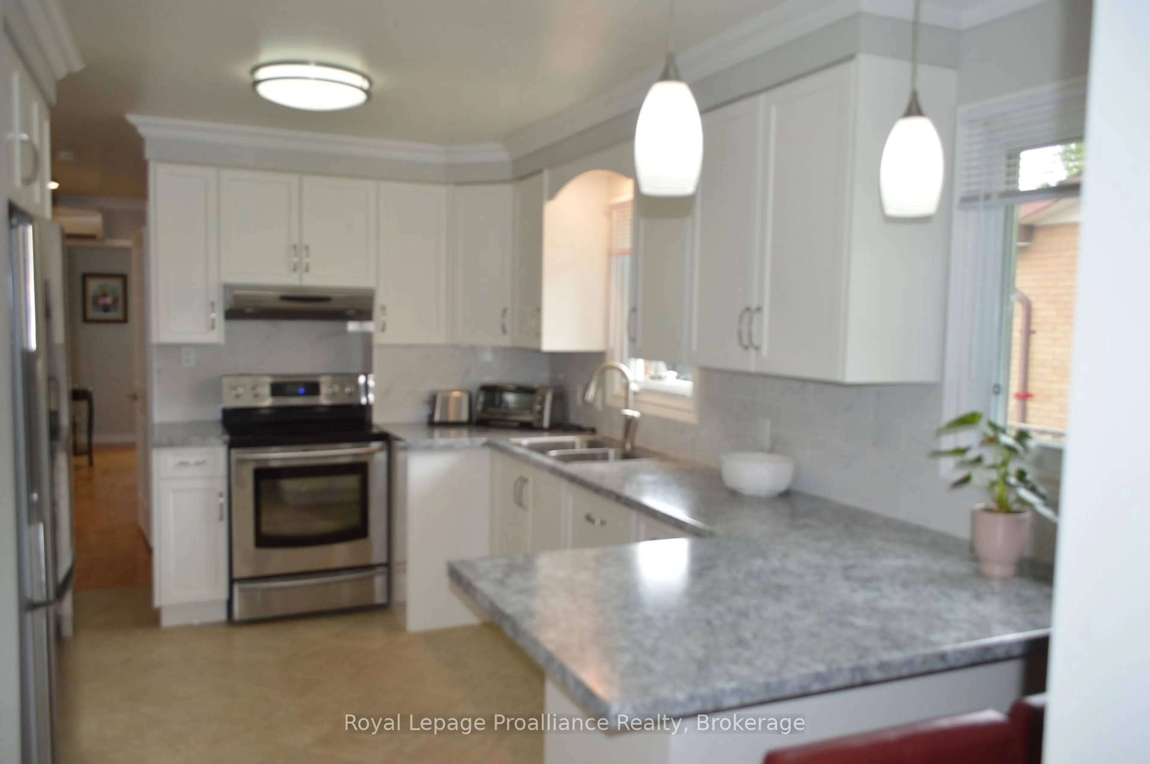Open concept kitchen, ceramic/tile floor for 9 Austin St, Quinte West Ontario K8V 1Z2
