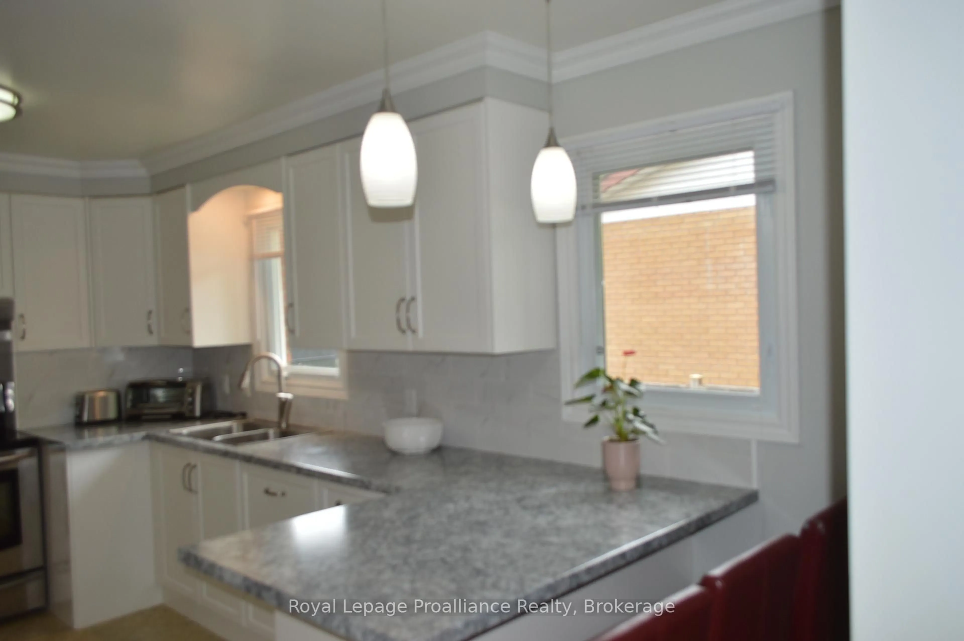 Open concept kitchen, ceramic/tile floor for 9 Austin St, Quinte West Ontario K8V 1Z2