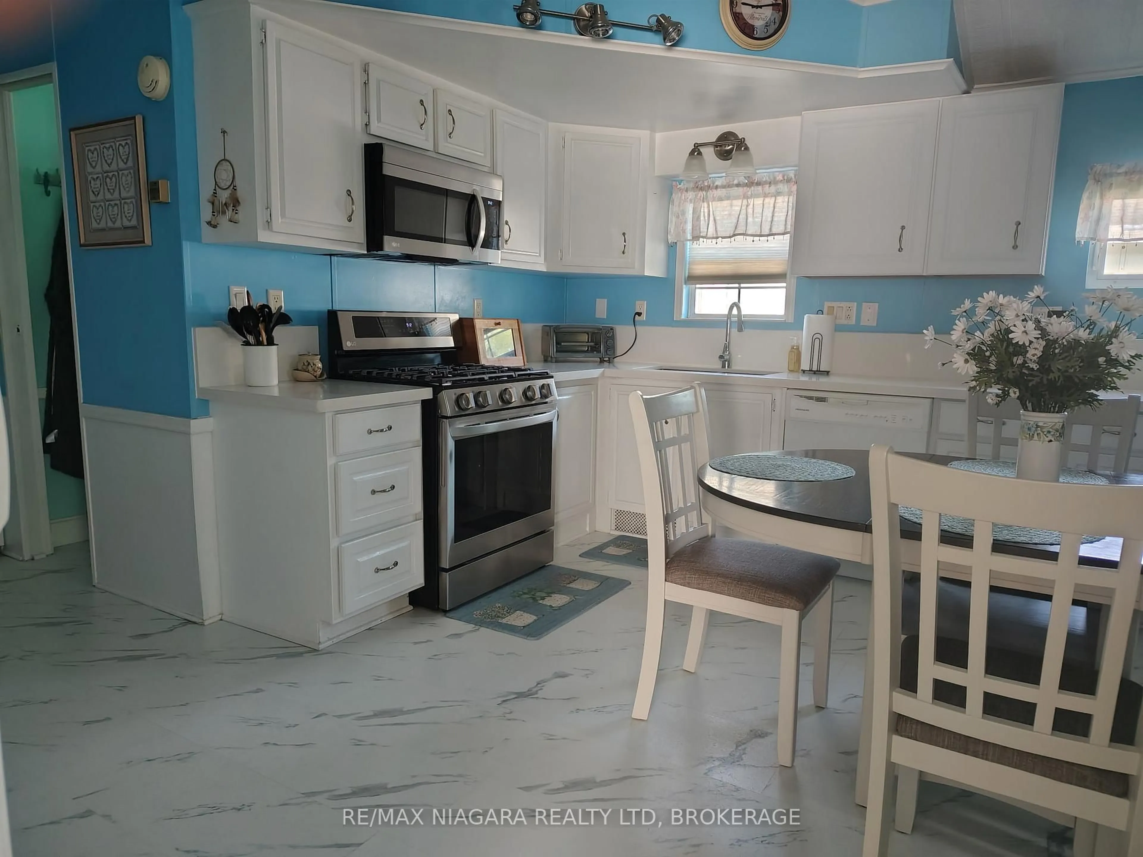 Open concept kitchen, ceramic/tile floor for 54 Quarry View Village, Port Colborne Ontario L0S 1R0