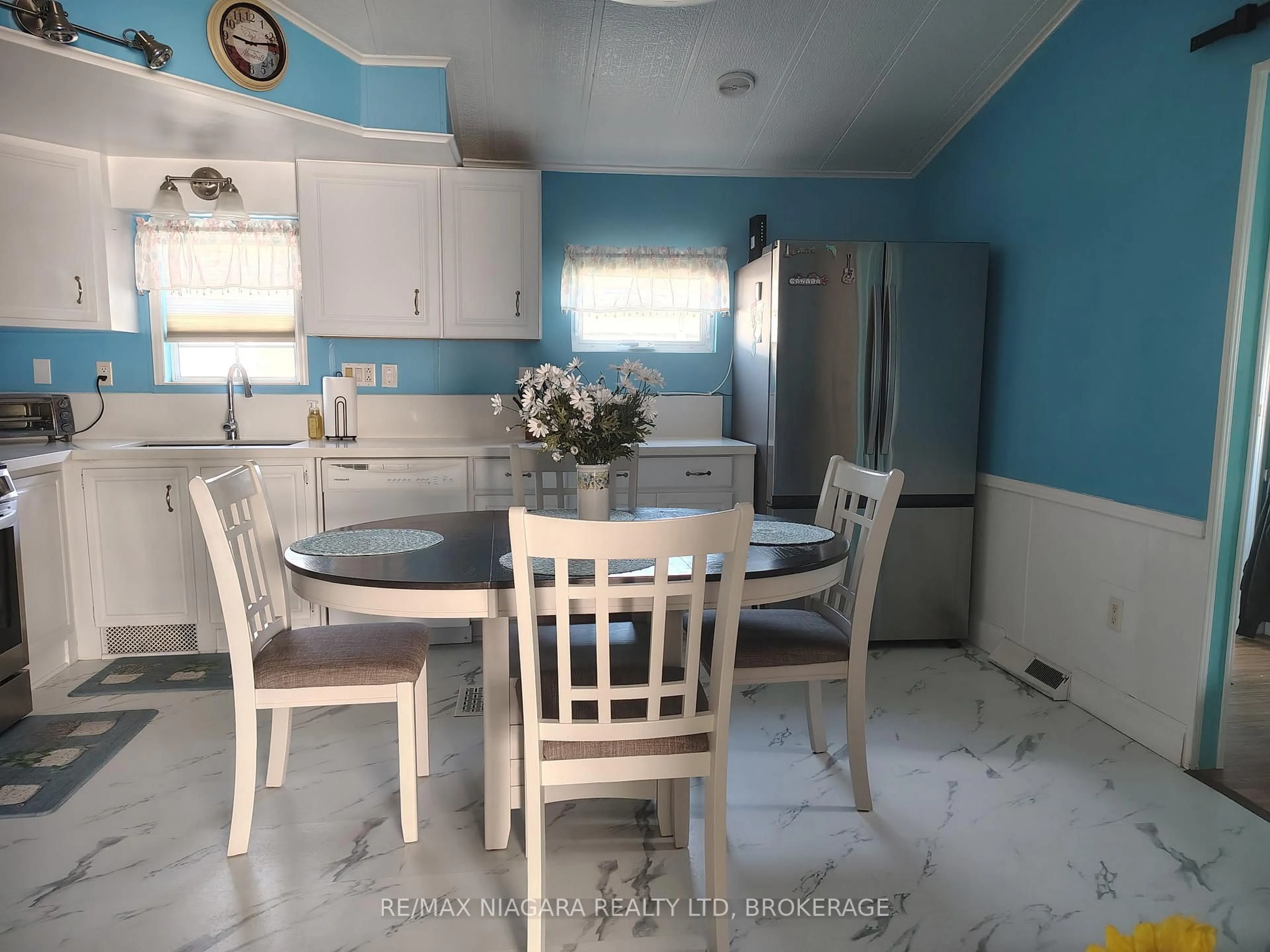 Dining room, ceramic/tile floor for 54 Quarry View Village, Port Colborne Ontario L0S 1R0