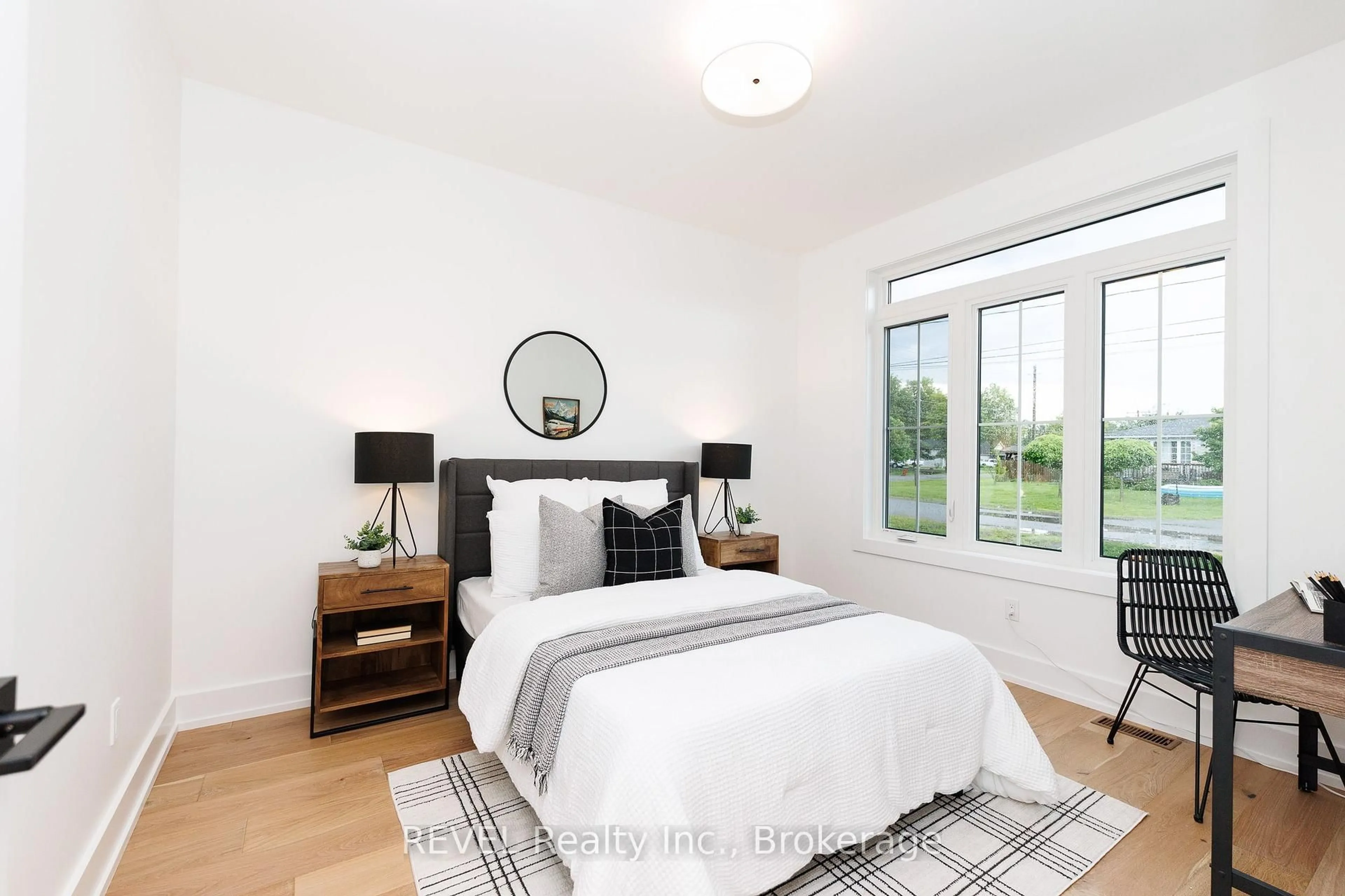 Bedroom with bed, wood/laminate floor for 1133 Dipietro St, Fort Erie Ontario L2A 4J4