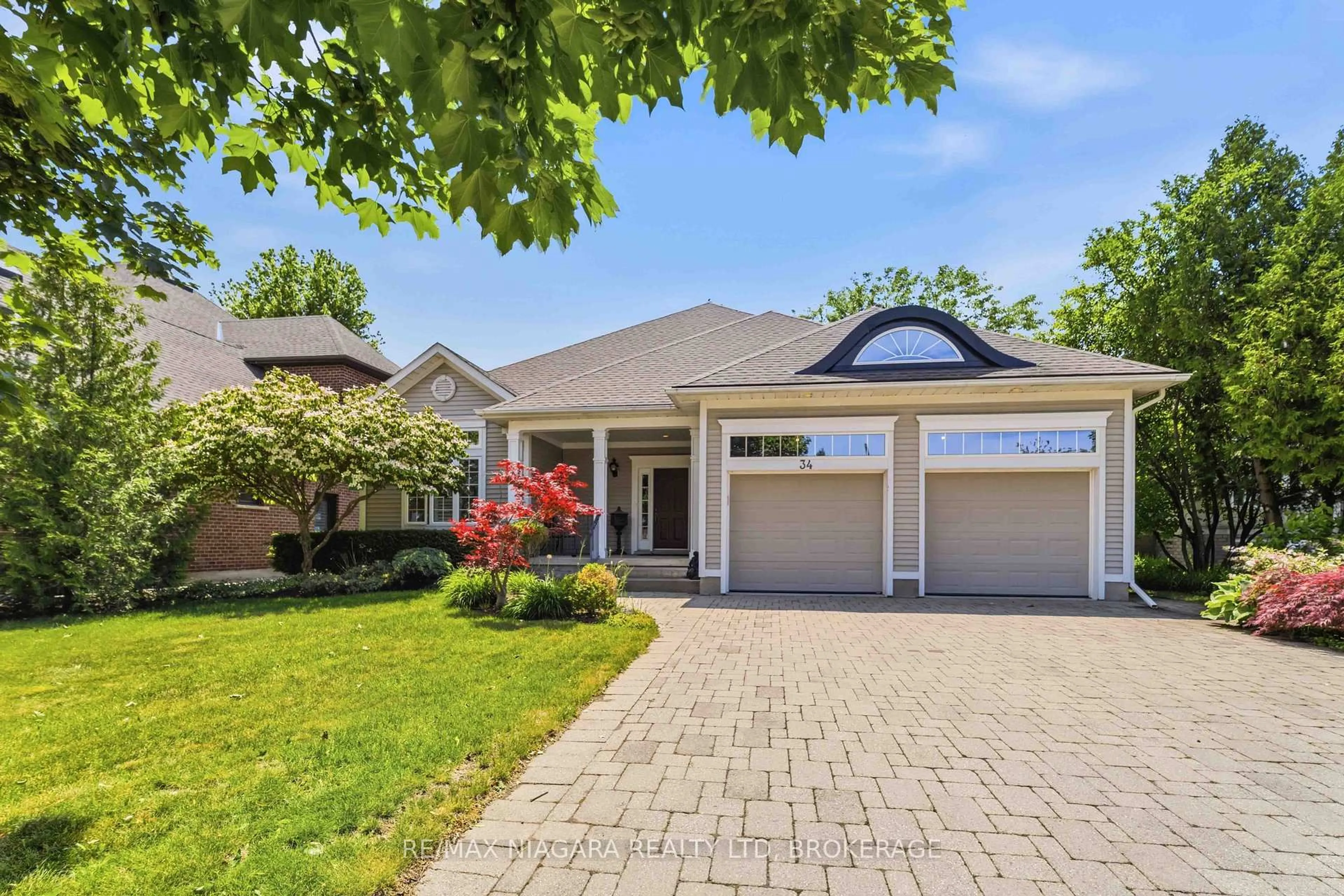 Home with brick exterior material, street for 34 Sculler's Way, St. Catharines Ontario L2N 7T1
