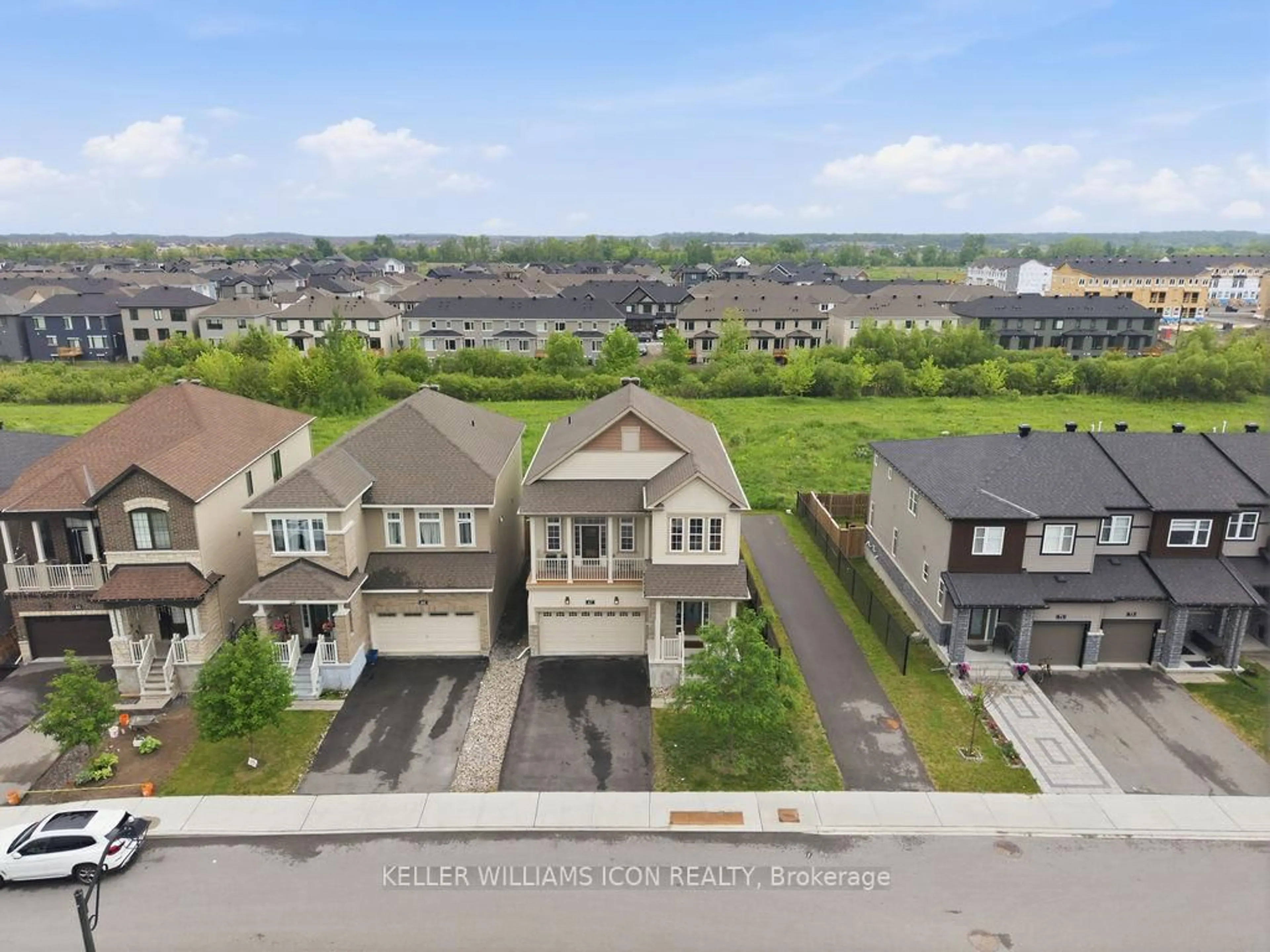 A pic from outside/outdoor area/front of a property/back of a property/a pic from drone, street for 67 AURA Ave, Ottawa Ontario K2J 6R9