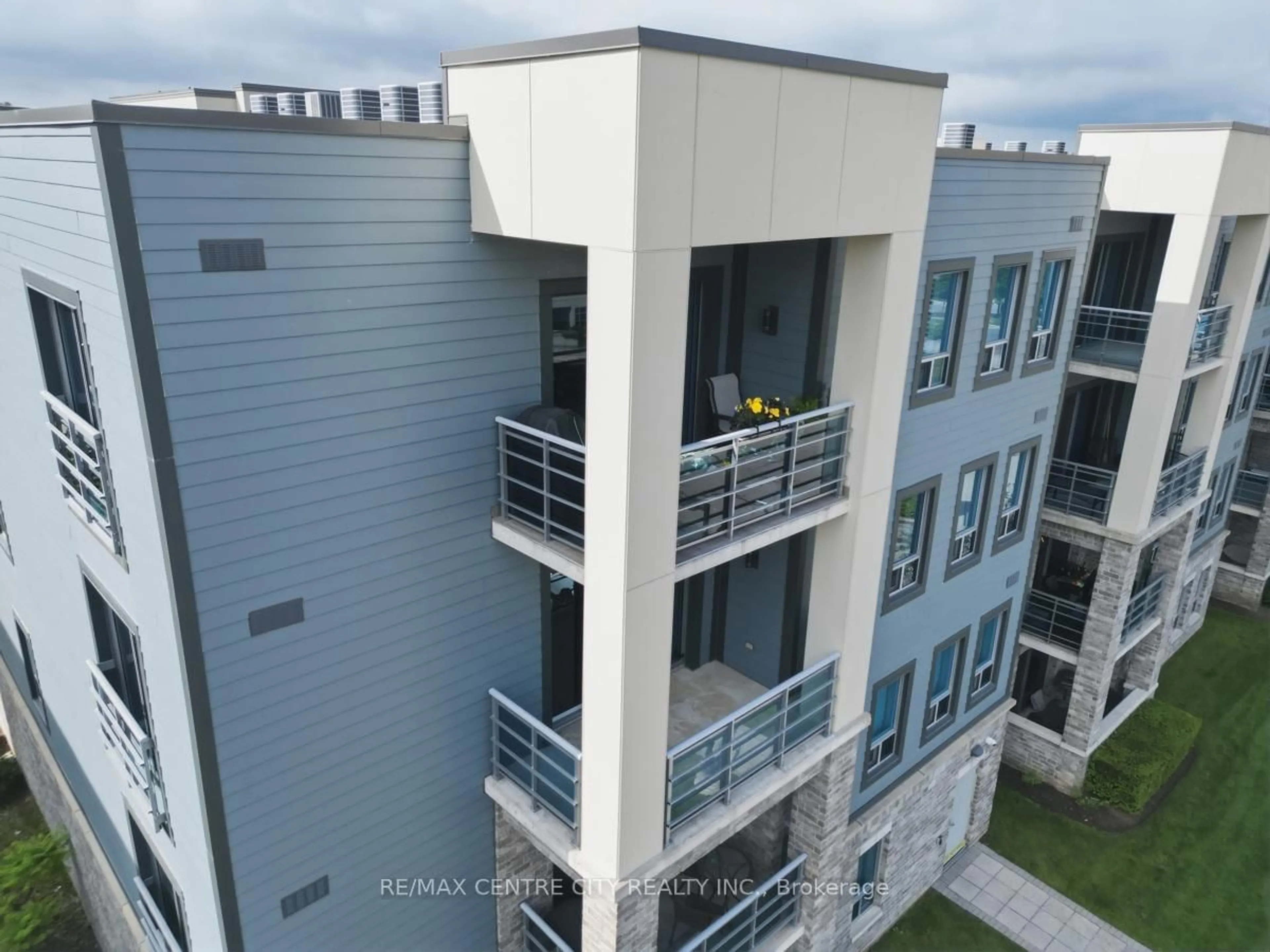 A pic from outside/outdoor area/front of a property/back of a property/a pic from drone, city buildings view from balcony for 340 Sugarcreek Tr #501, London North Ontario N6H 0G4