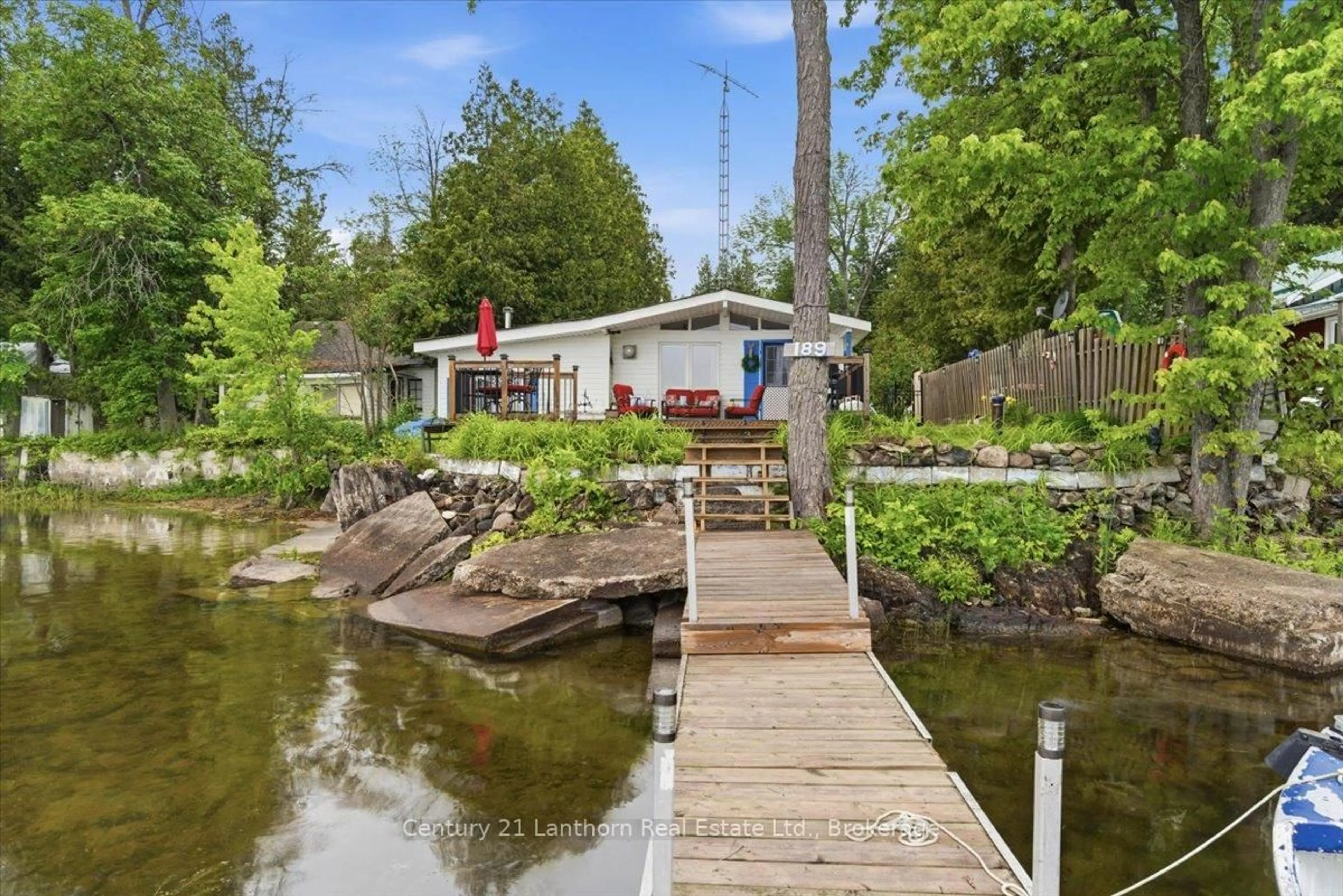 A pic from outside/outdoor area/front of a property/back of a property/a pic from drone, water/lake/river/ocean view for 189 Darby Point Lane, Madoc Ontario K0K 2K0