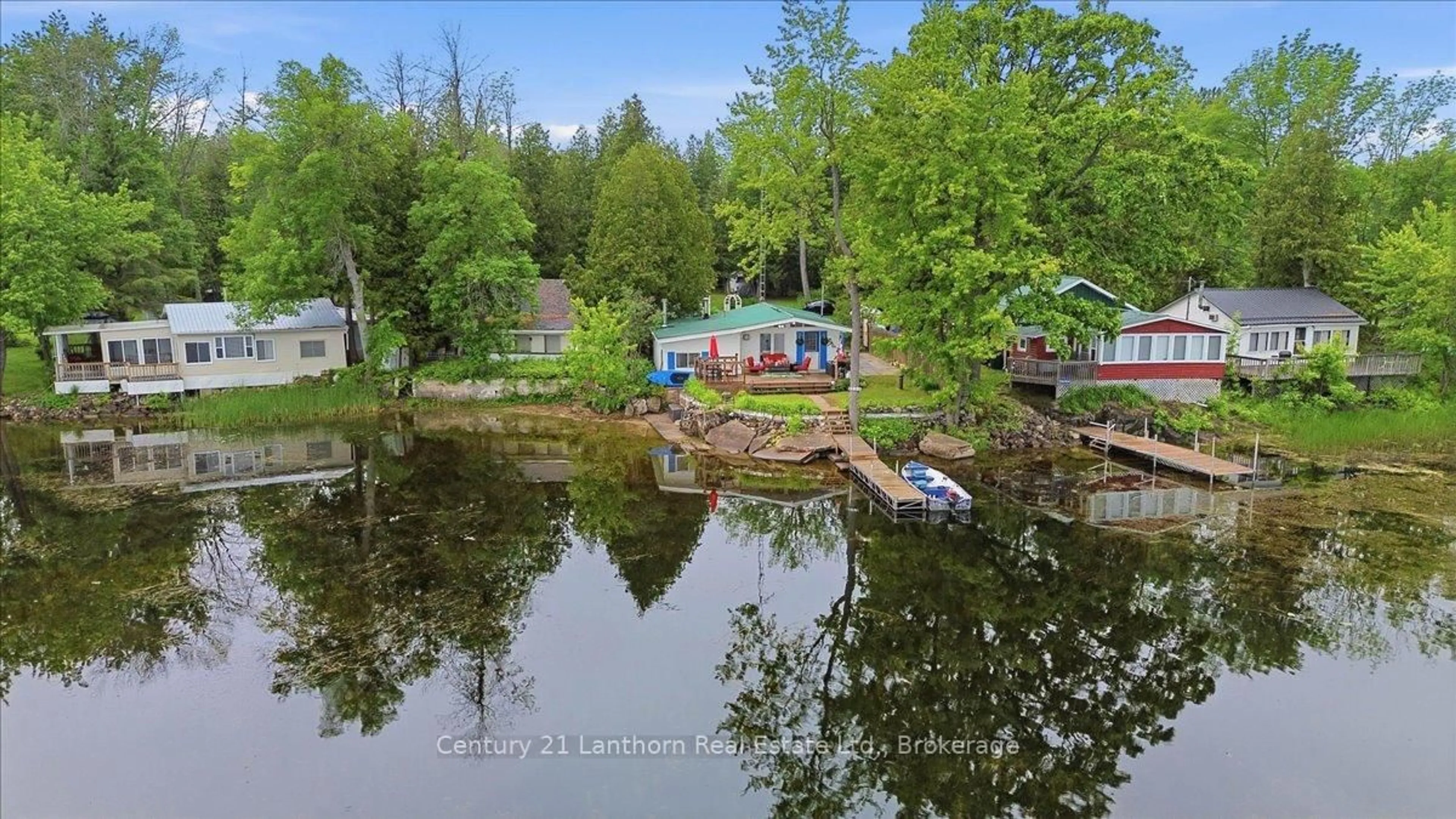 A pic from outside/outdoor area/front of a property/back of a property/a pic from drone, water/lake/river/ocean view for 189 Darby Point Lane, Madoc Ontario K0K 2K0