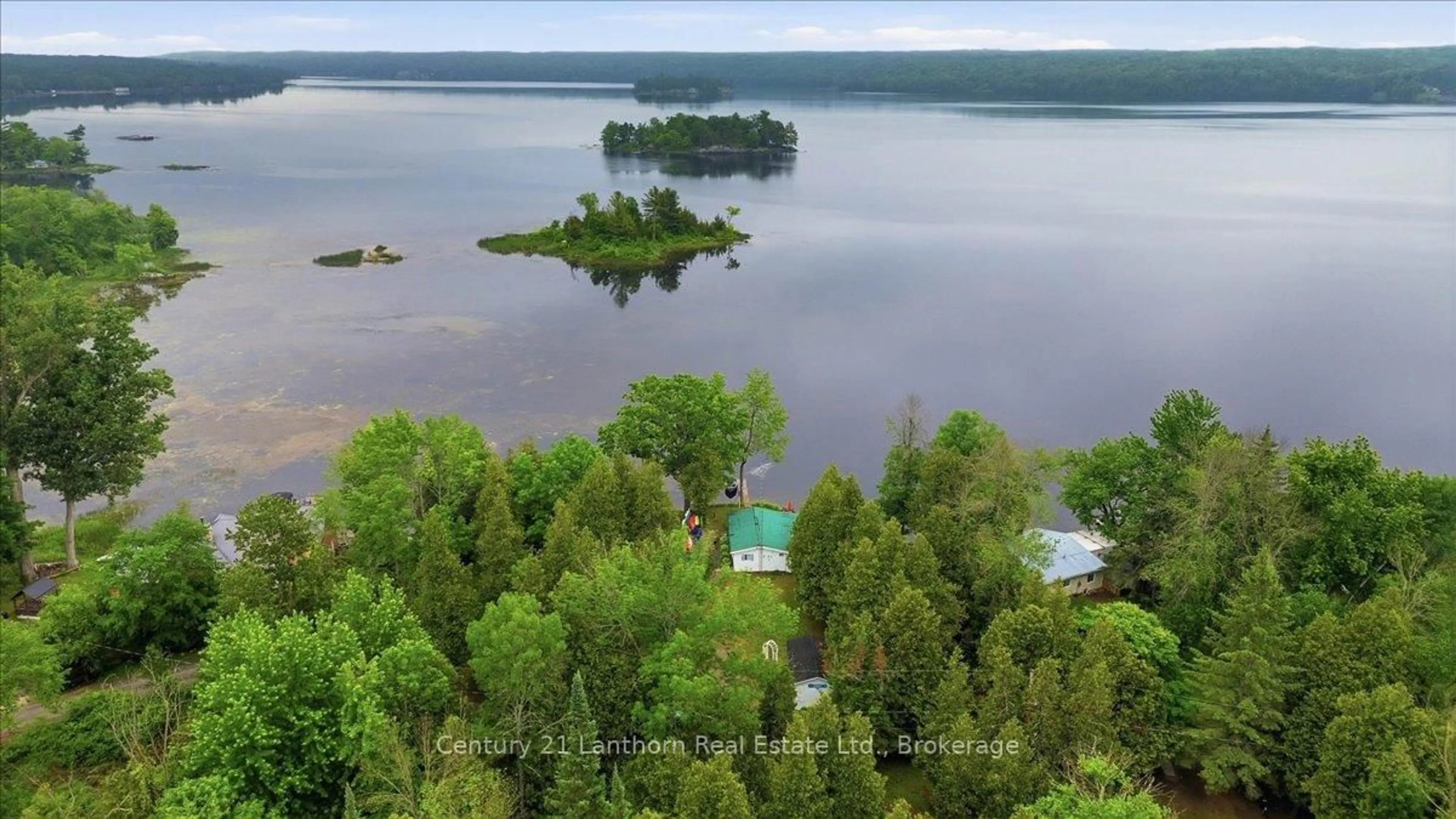 A pic from outside/outdoor area/front of a property/back of a property/a pic from drone, water/lake/river/ocean view for 189 Darby Point Lane, Madoc Ontario K0K 2K0