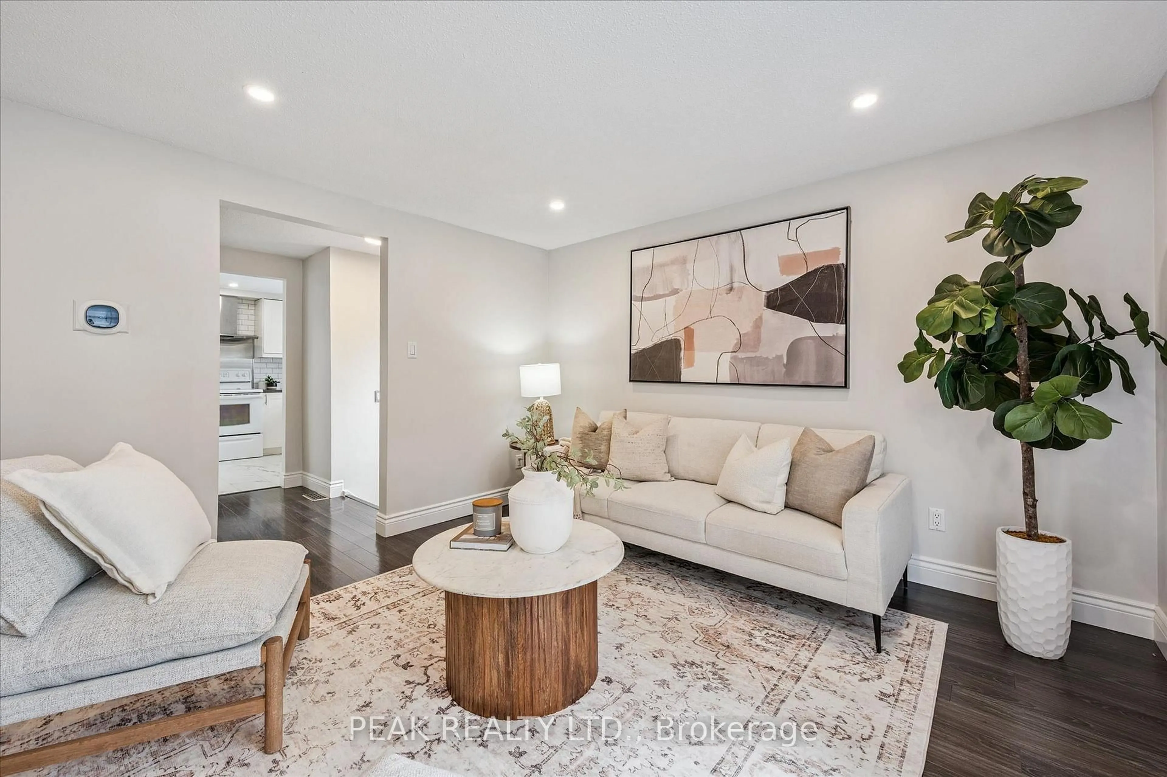 Living room with furniture, wood/laminate floor for 694 Highpoint Ave #B, Waterloo Ontario N2V 1G9