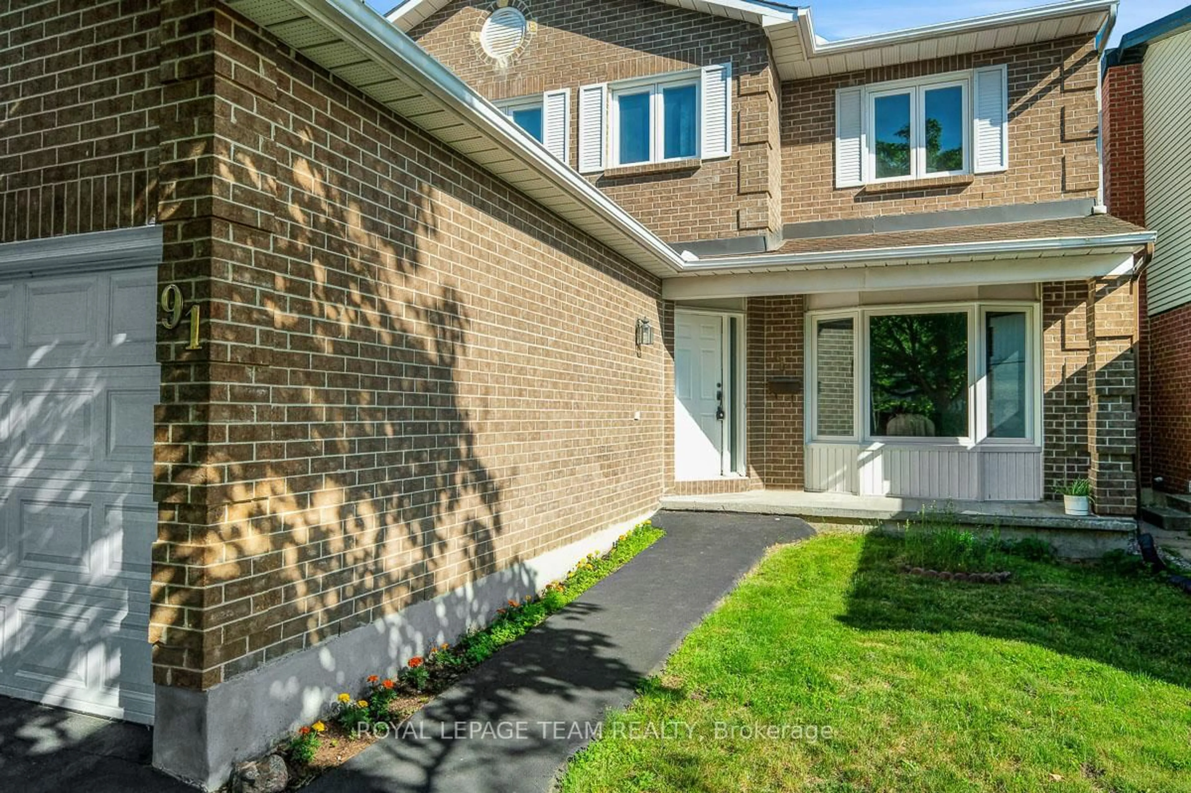 Home with brick exterior material, street for 91 Dossetter Way, Ottawa Ontario K1G 4S6