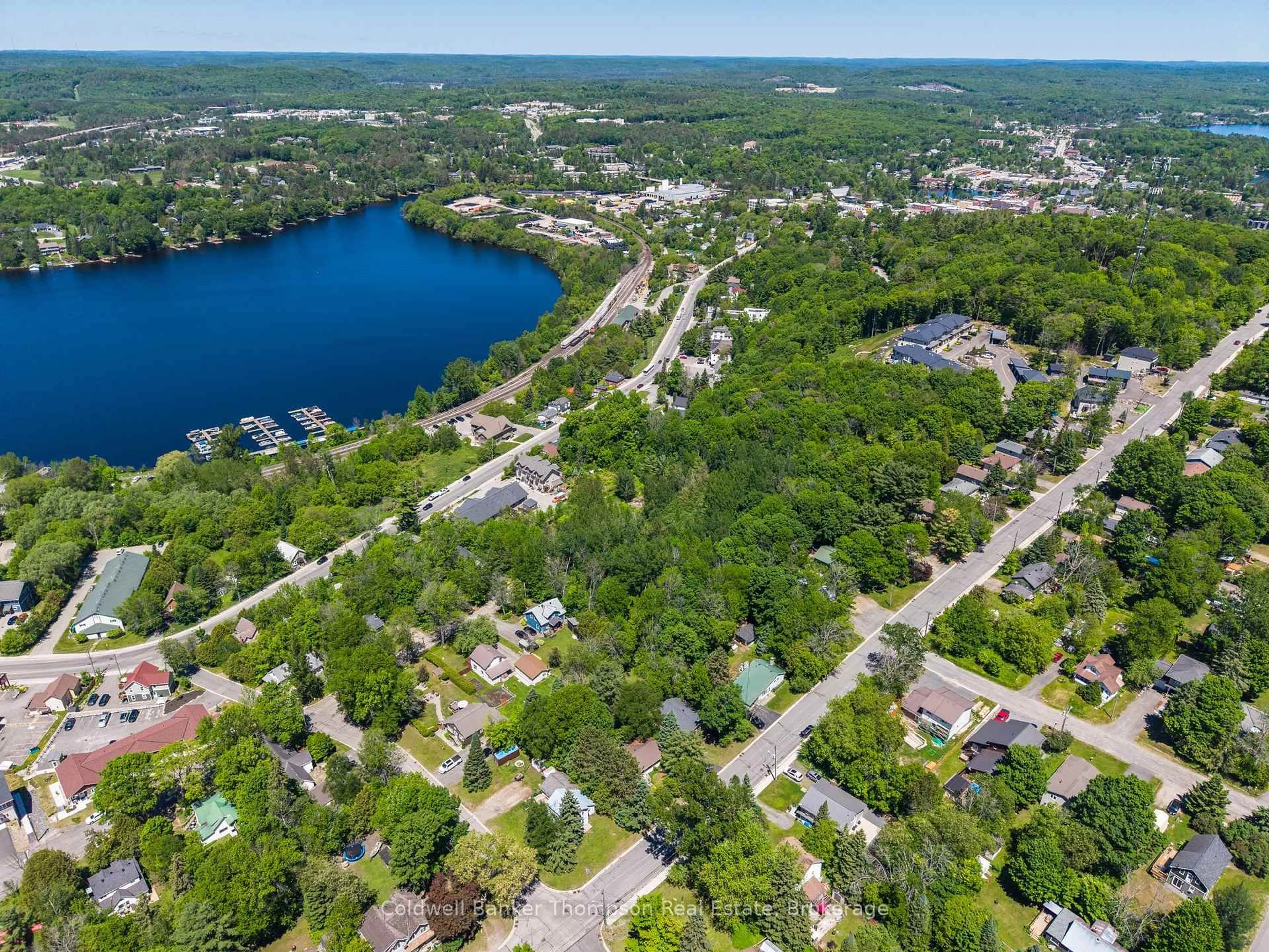 A pic from outside/outdoor area/front of a property/back of a property/a pic from drone, water/lake/river/ocean view for 6 Johanna St, Huntsville Ontario P1H 1V5