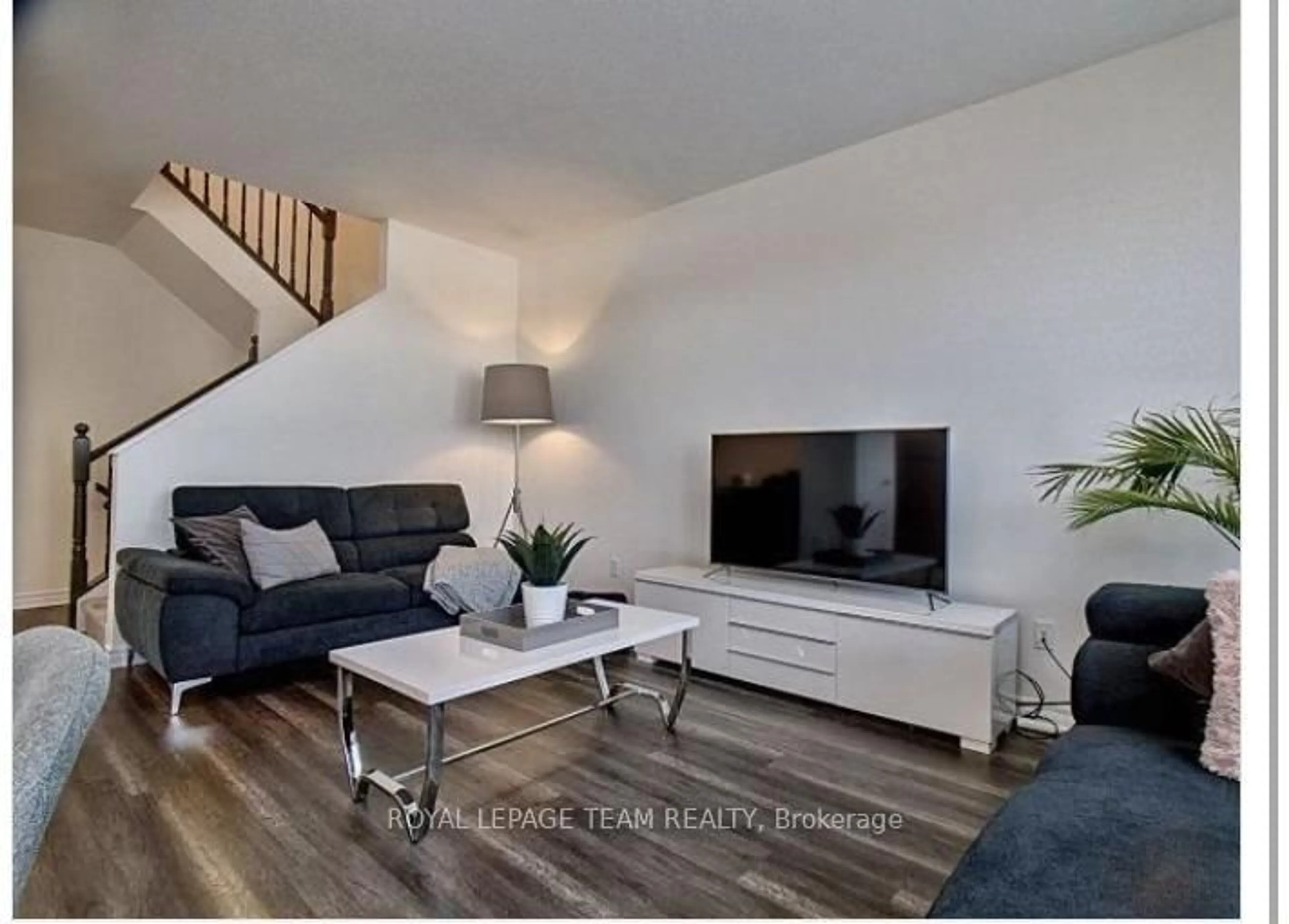 Living room with furniture, wood/laminate floor for 195 Kimpton Dr, Ottawa Ontario K2S 2H9
