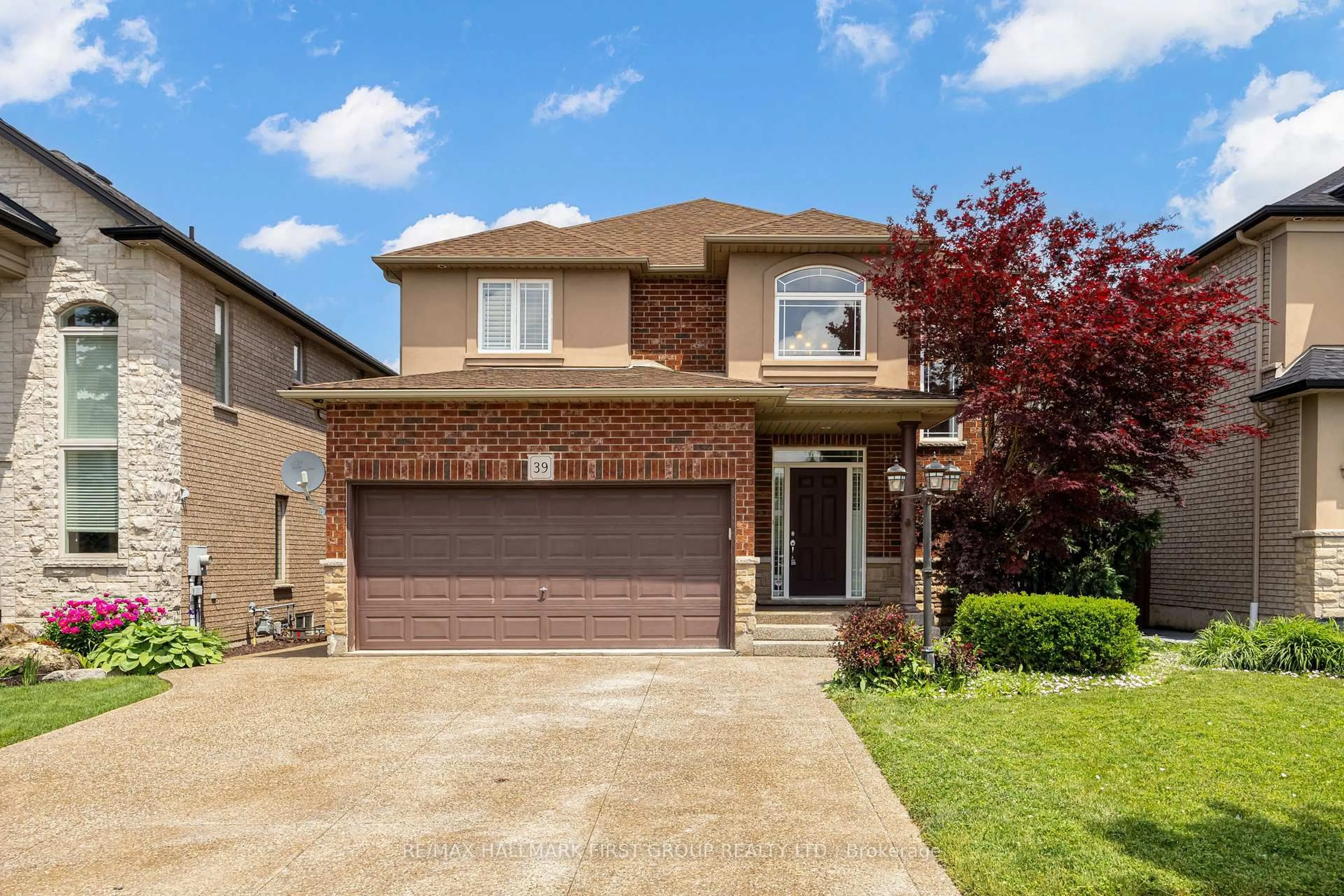 Home with brick exterior material, street for 39 Citino Dr, Hamilton Ontario L9C 0A4