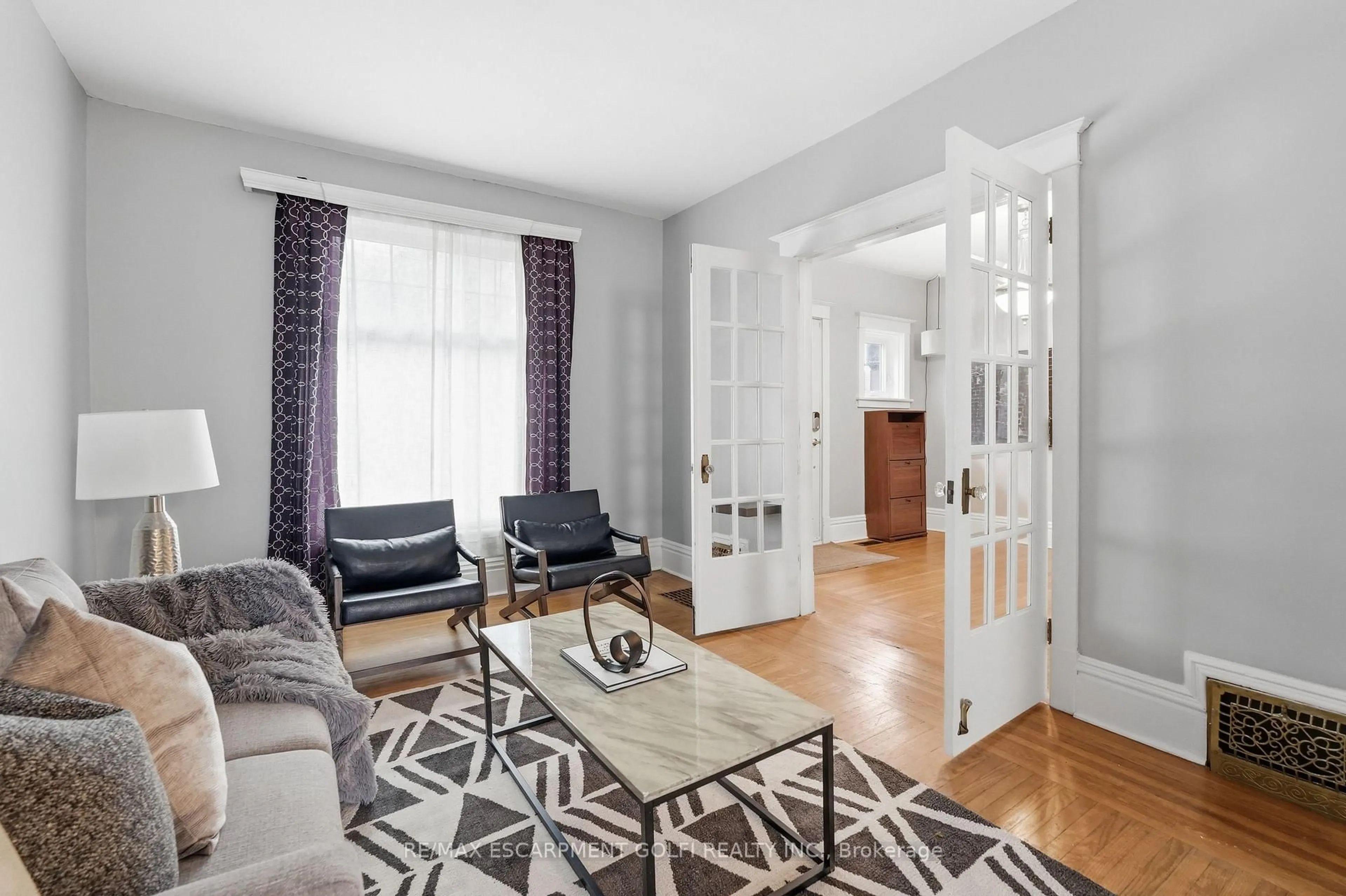 Living room with furniture, unknown for 71 Aikman Ave, Hamilton Ontario L8M 1P8