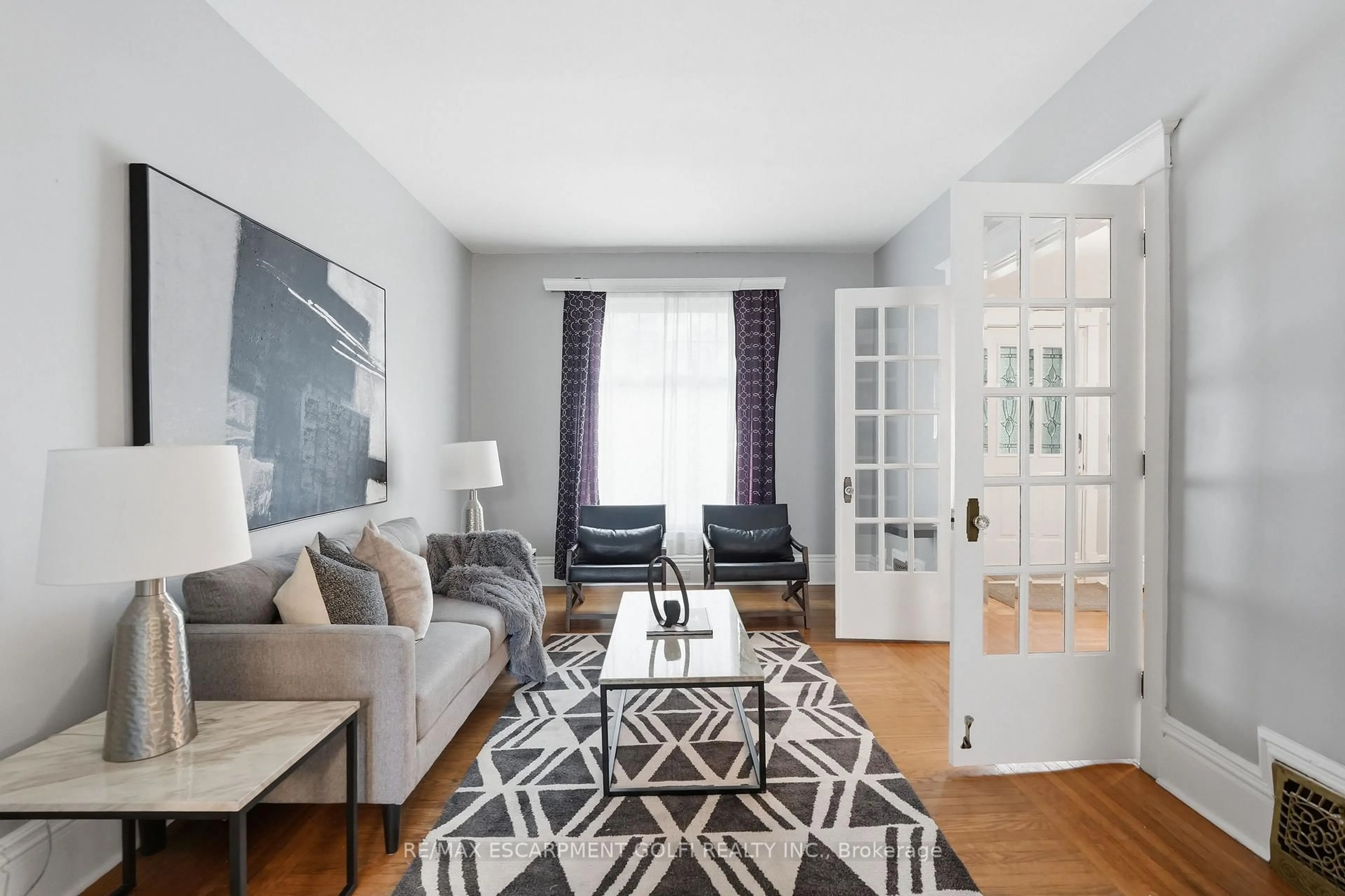 Living room with furniture, unknown for 71 Aikman Ave, Hamilton Ontario L8M 1P8