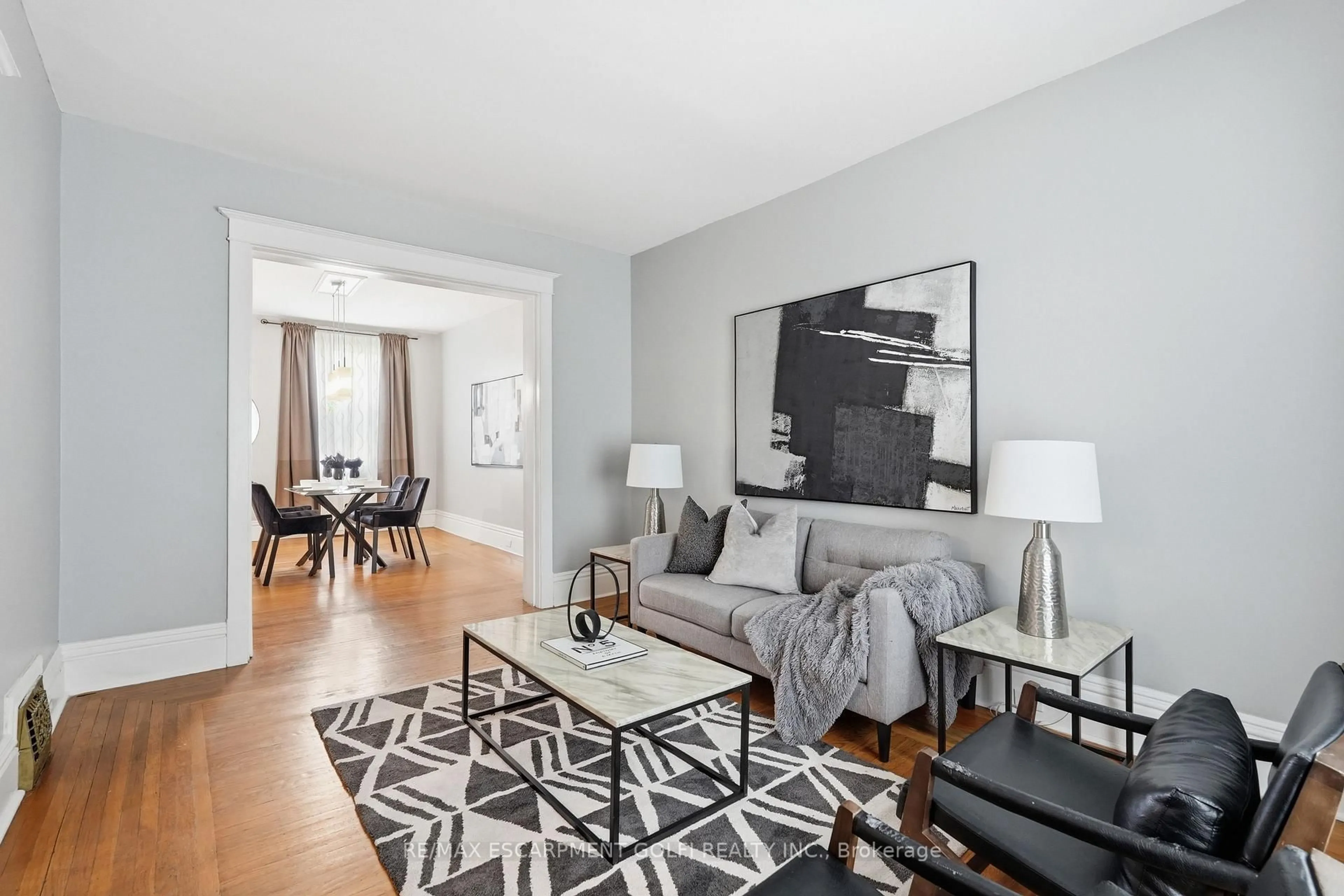 Living room with furniture, unknown for 71 Aikman Ave, Hamilton Ontario L8M 1P8