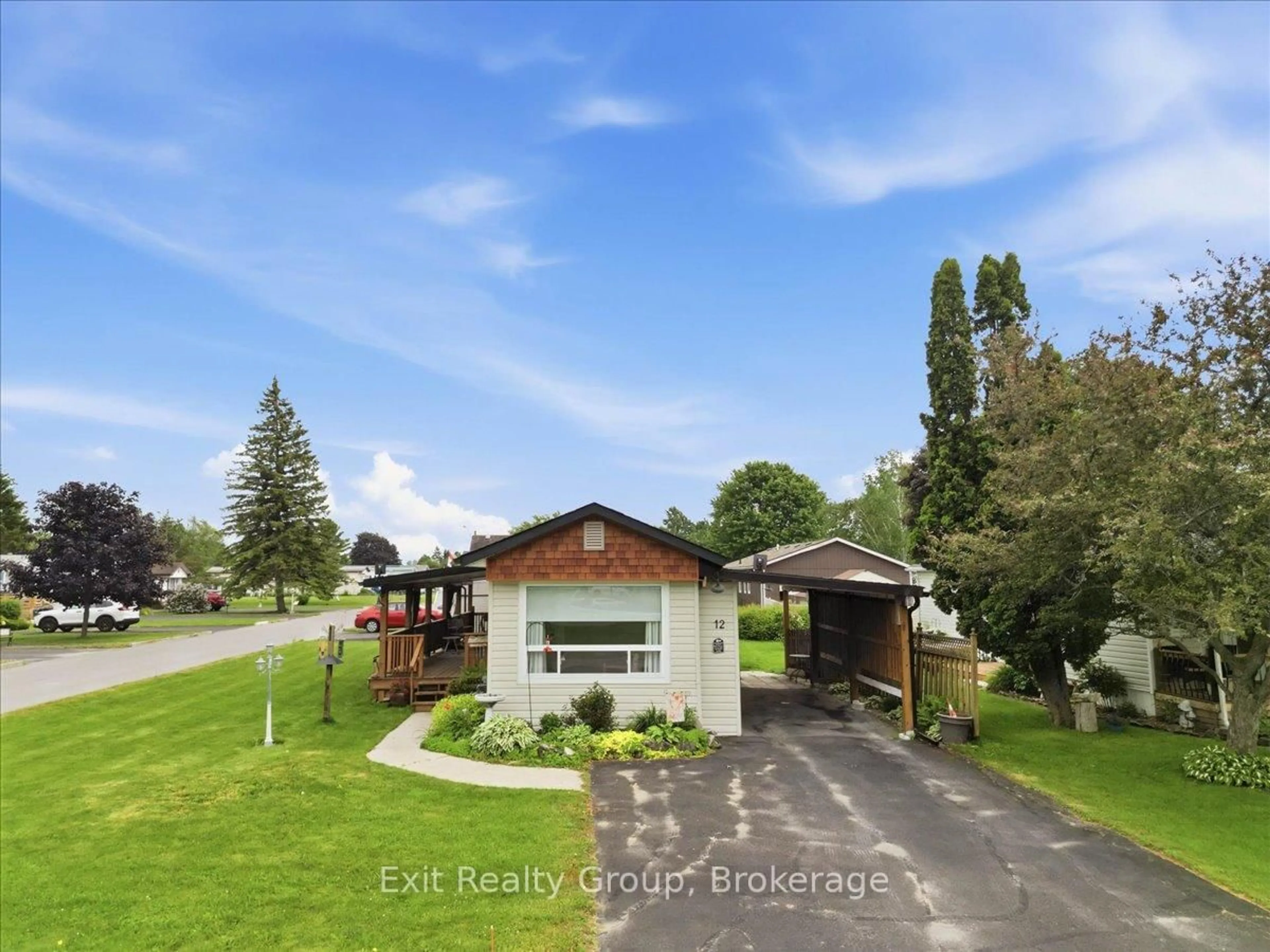 A pic from outside/outdoor area/front of a property/back of a property/a pic from drone, unknown for 12 Park Lane, Quinte West Ontario K8N 2G6