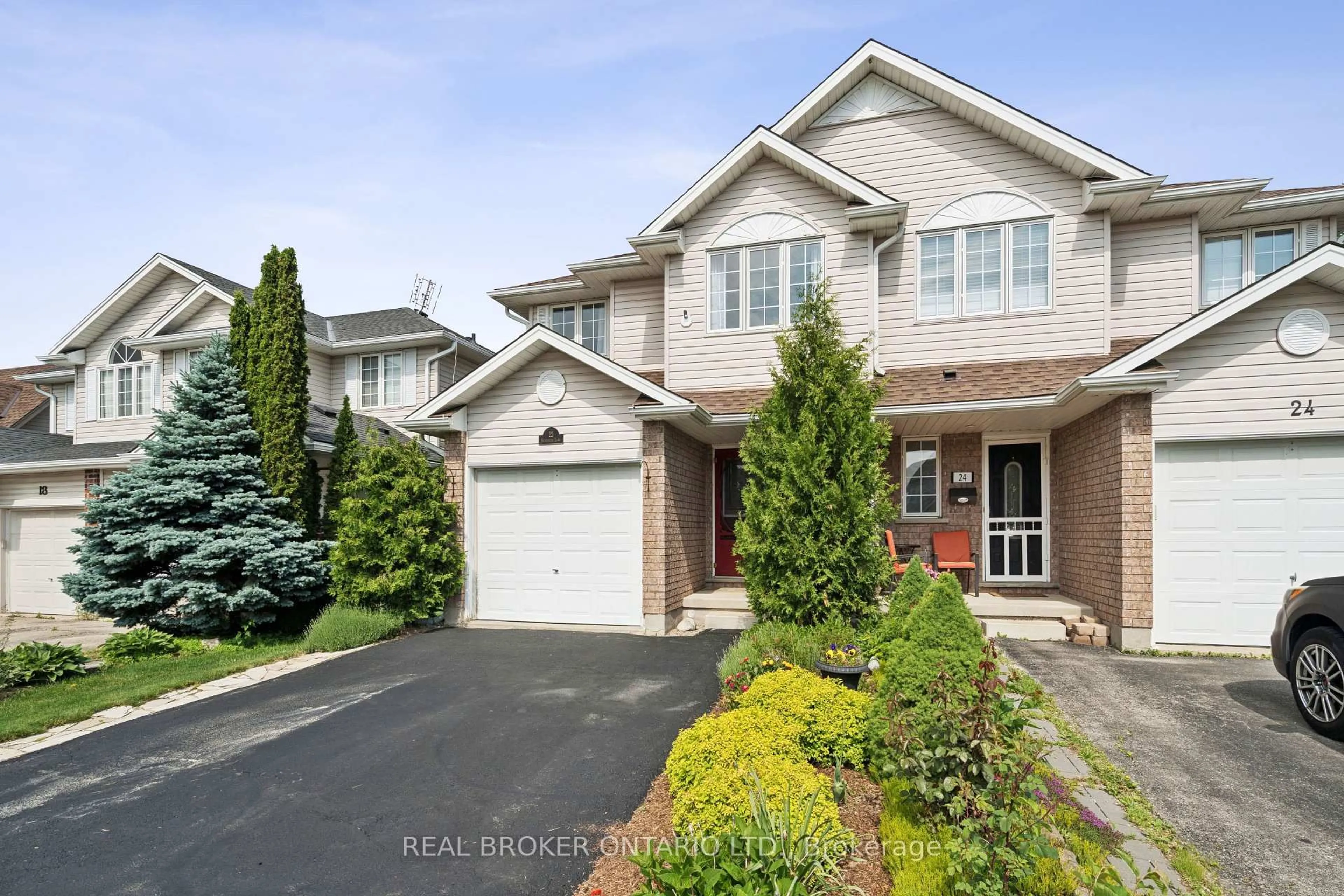 Home with brick exterior material, street for 22 Sandcreek Lane, Guelph Ontario N1E 7K9