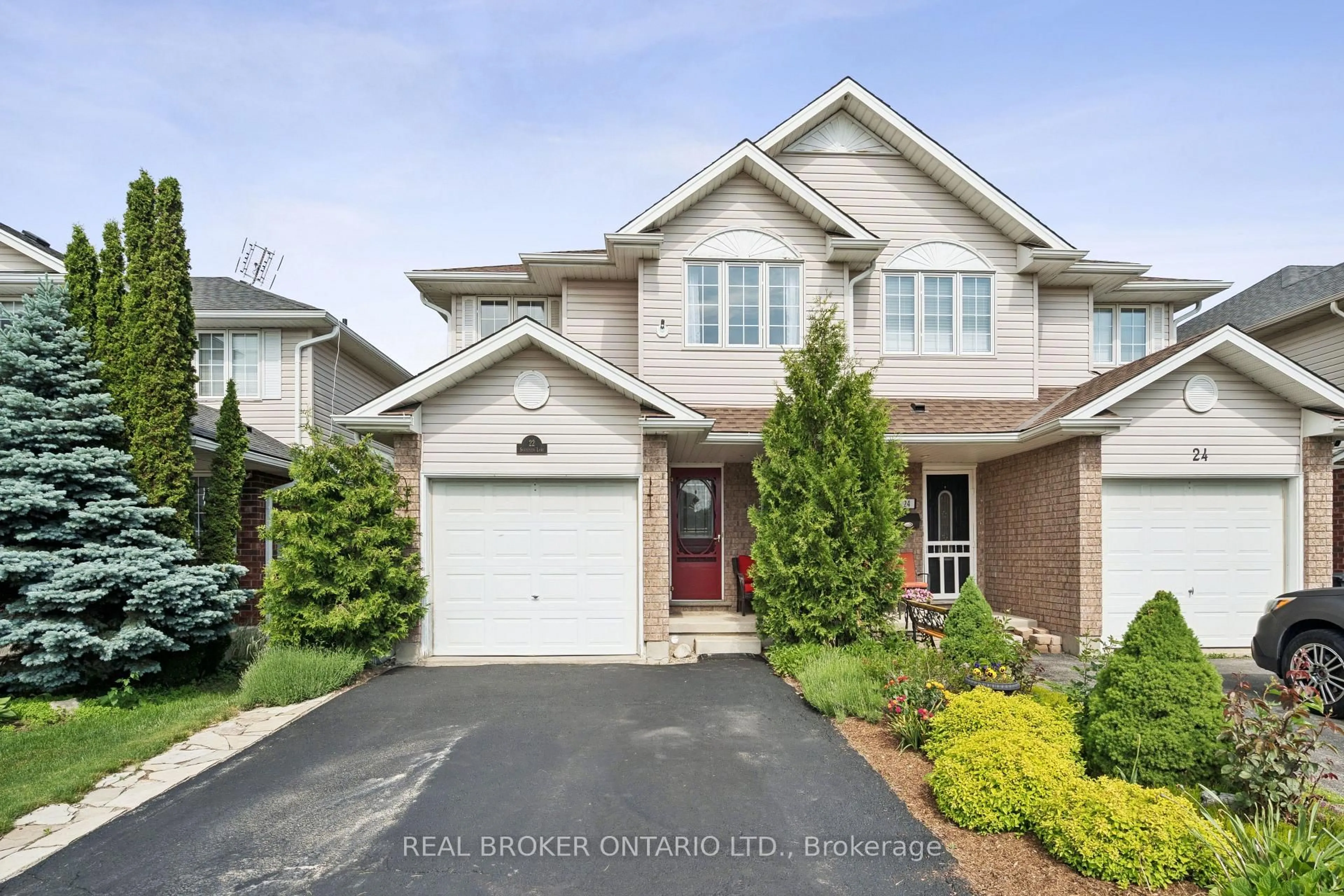 Home with brick exterior material, street for 22 Sandcreek Lane, Guelph Ontario N1E 7K9