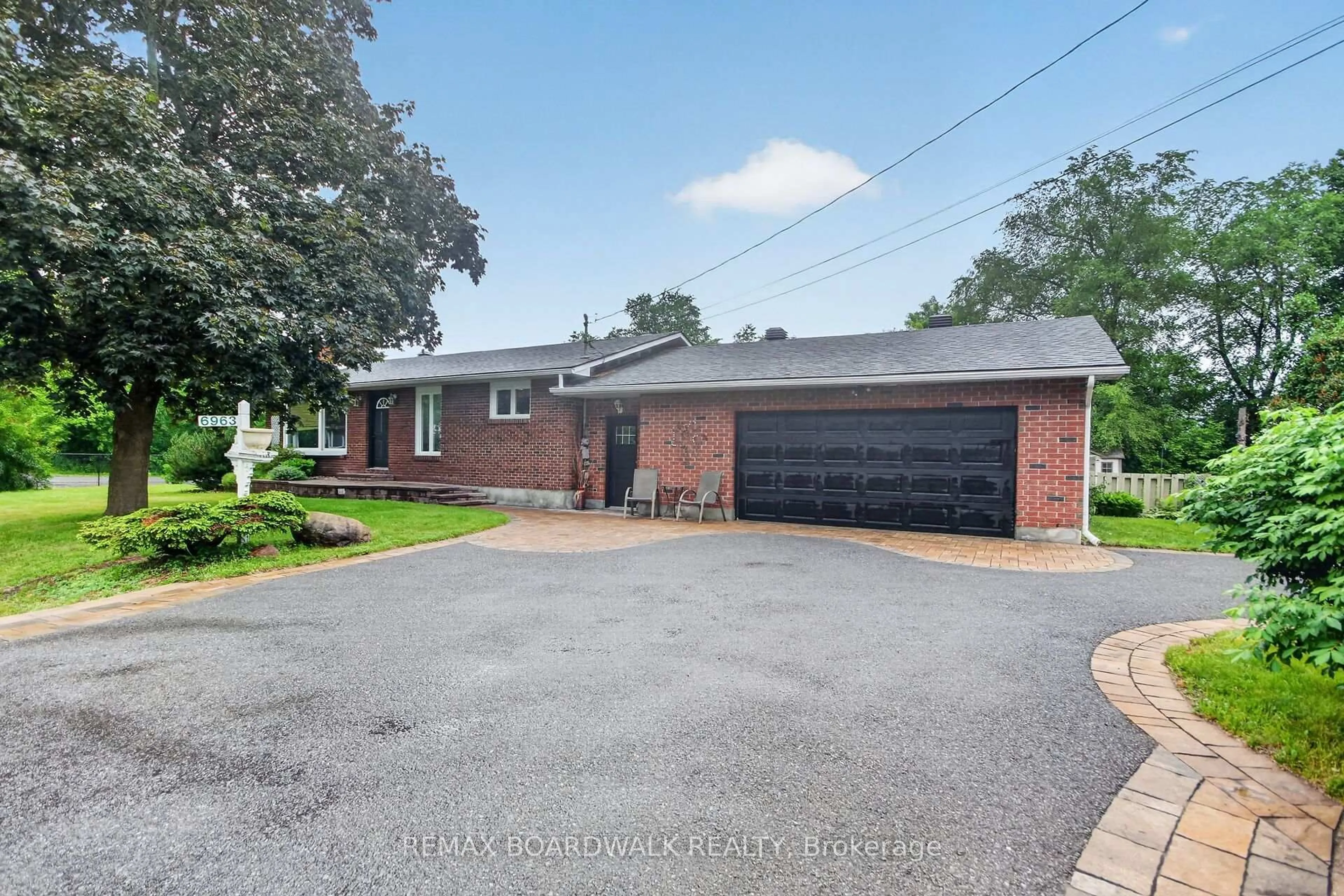Home with brick exterior material, street for 6963 Marco St, Ottawa Ontario K4P 1C4
