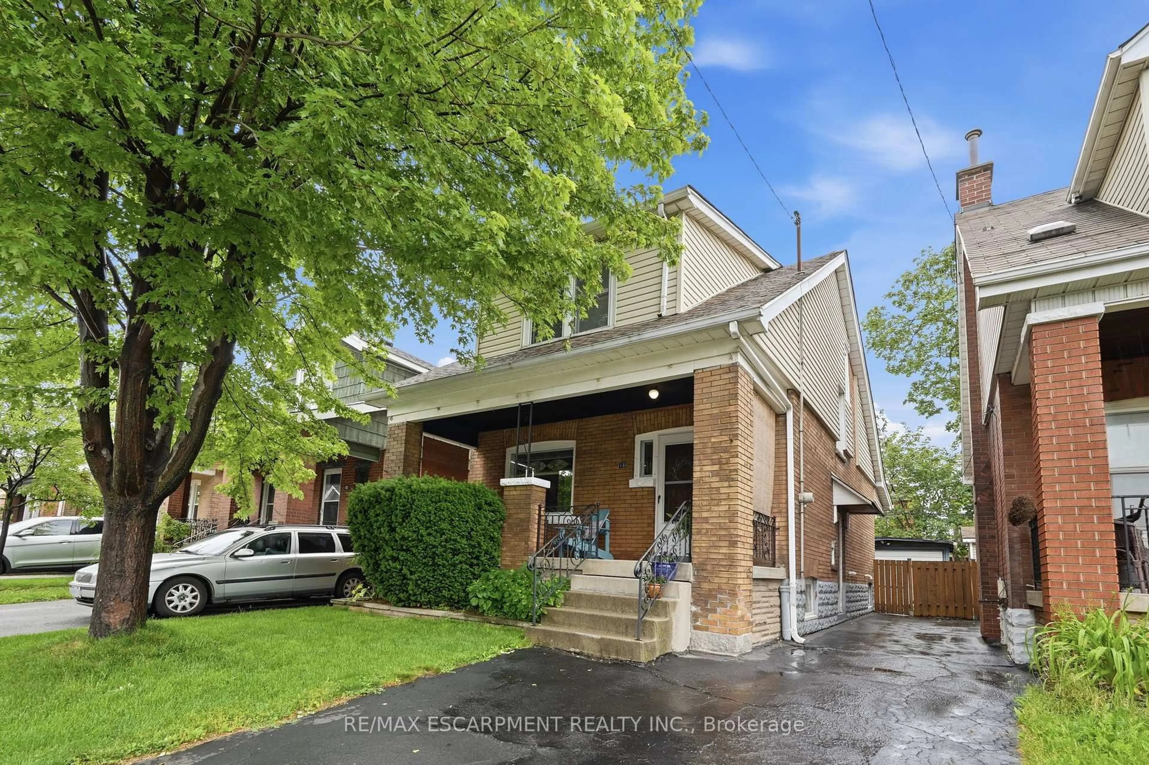 Home with brick exterior material, street for 16 CONNAUGHT Ave, Hamilton Ontario L8L 6Y7