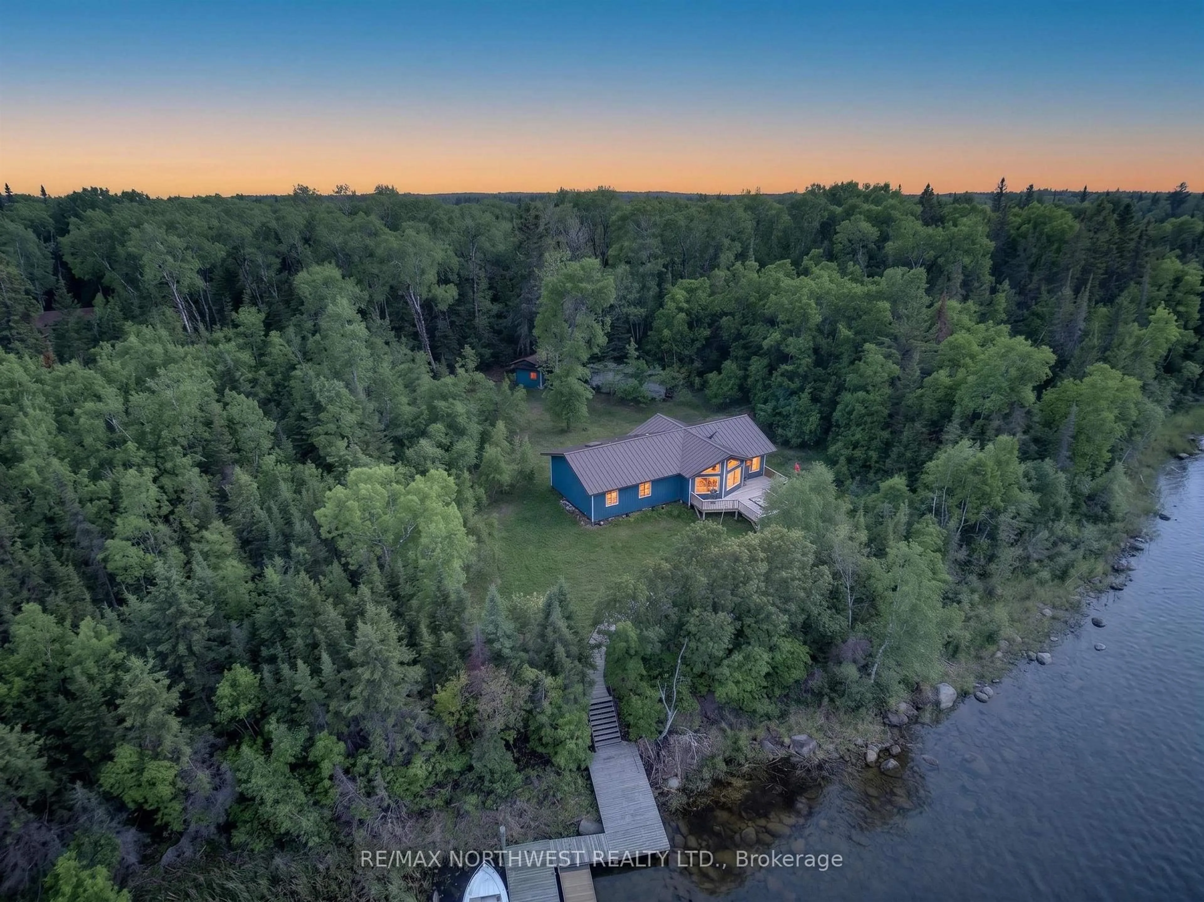 A pic from outside/outdoor area/front of a property/back of a property/a pic from drone, water/lake/river/ocean view for 2747 Moore Bay, Sioux Narrows-Nestor Falls Ontario P0X 1H0