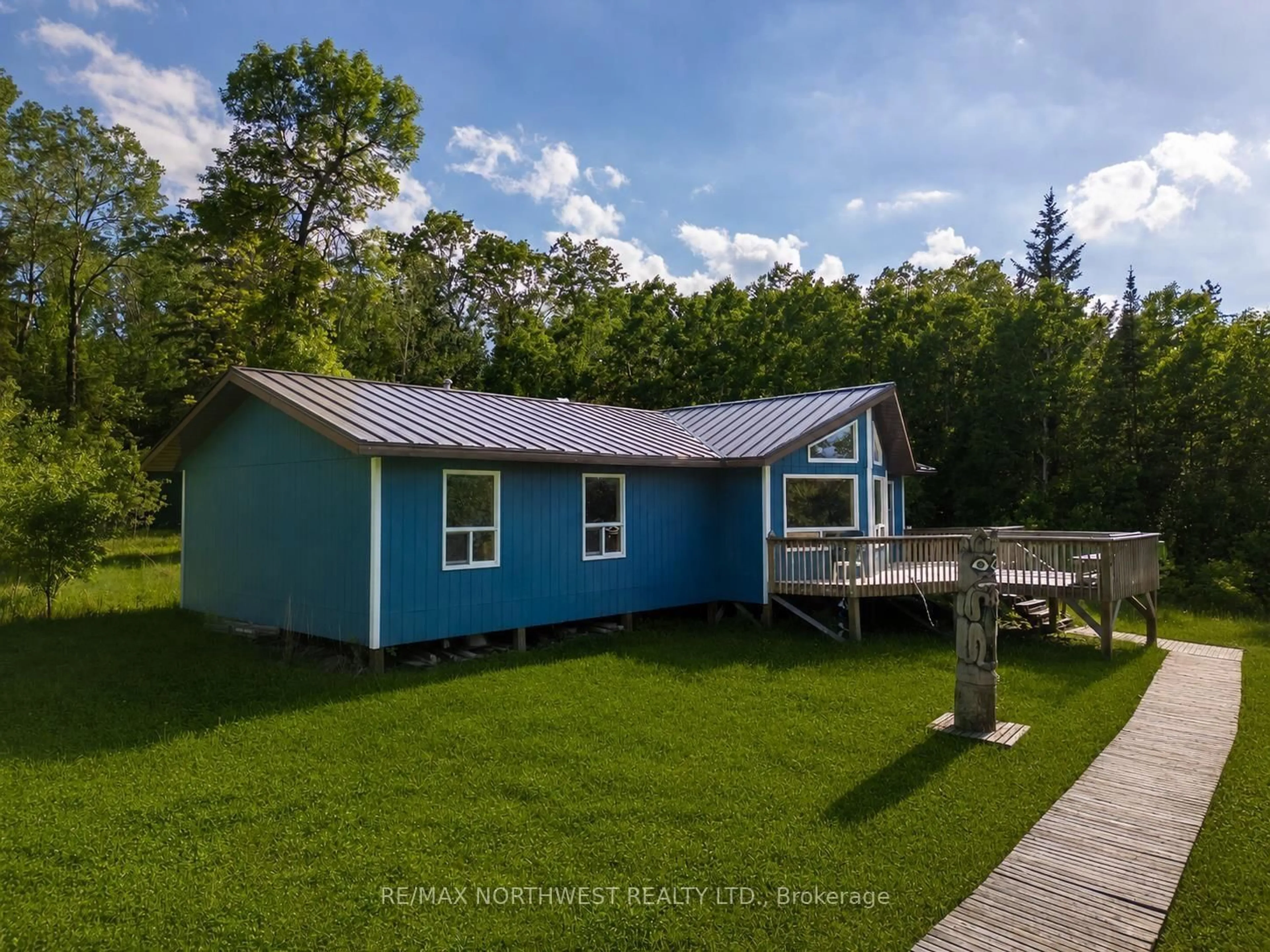 A pic from outside/outdoor area/front of a property/back of a property/a pic from drone, water/lake/river/ocean view for 2747 Moore Bay, Sioux Narrows-Nestor Falls Ontario P0X 1H0