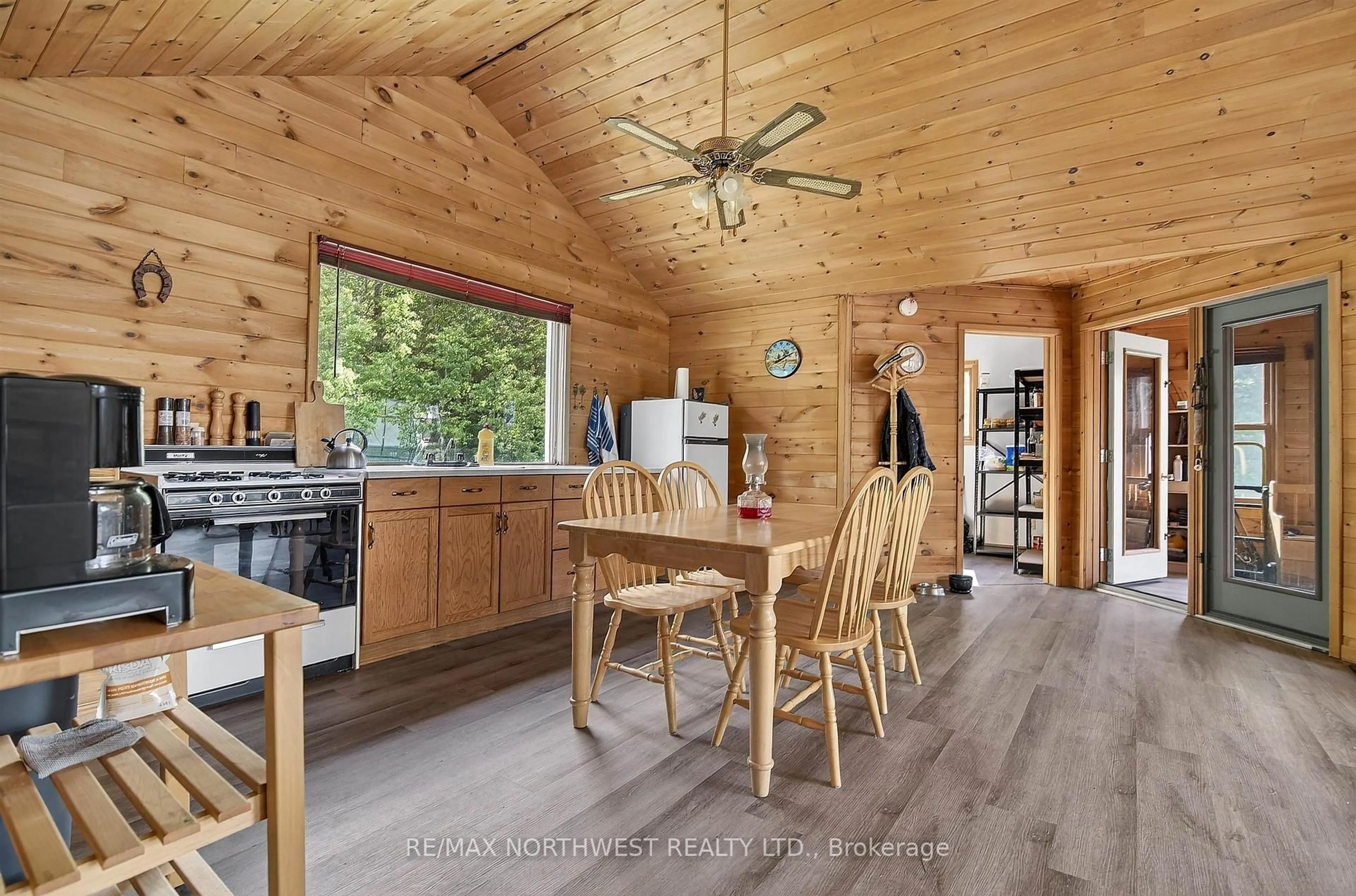 Open concept kitchen, wood/laminate floor for 2747 Moore Bay, Sioux Narrows-Nestor Falls Ontario P0X 1H0