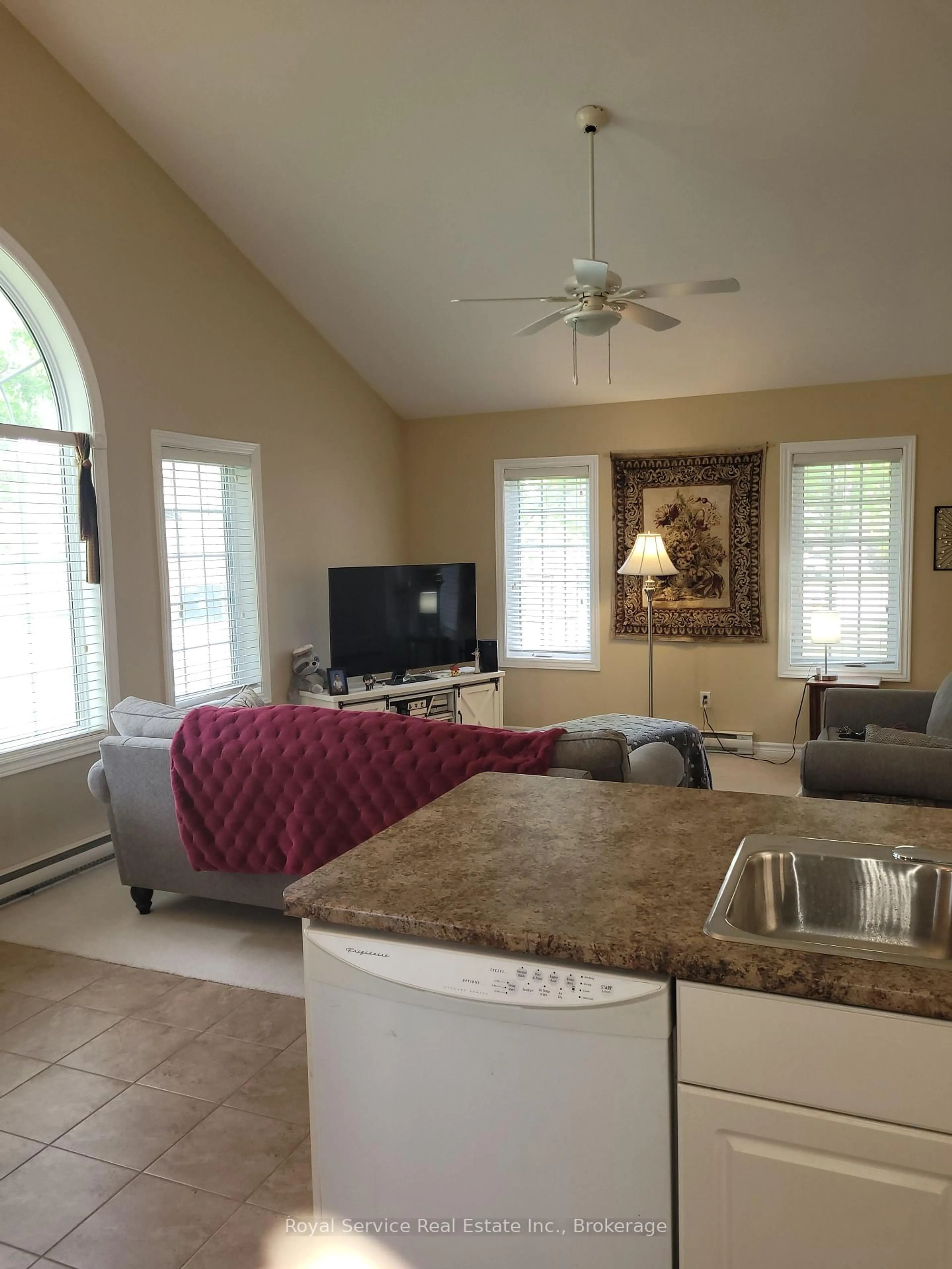 Living room with furniture, ceramic/tile floor for 325 Densmore Rd #102, Cobourg Ontario K9A 0E4