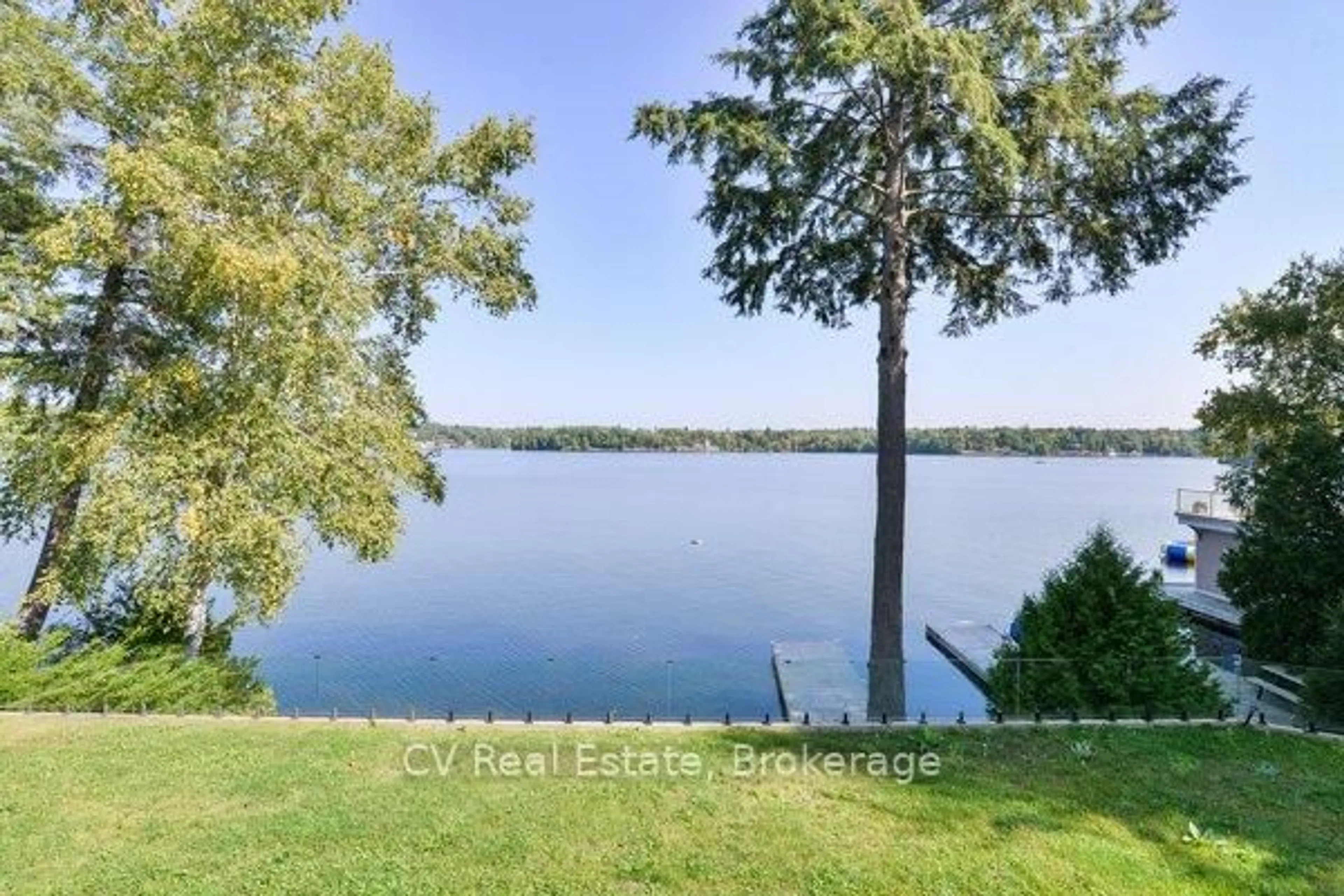 A pic from outside/outdoor area/front of a property/back of a property/a pic from drone, water/lake/river/ocean view for 1018 Georgina Way #1, Gravenhurst Ontario P1P 1R2