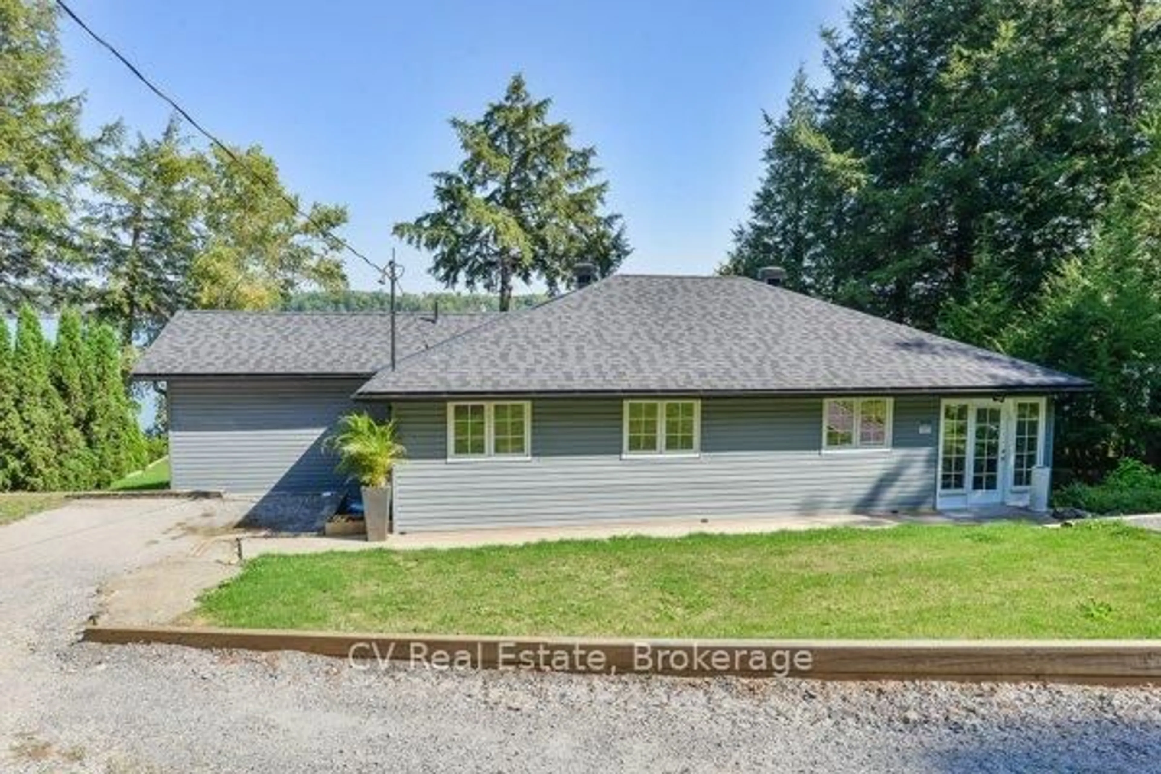 A pic from outside/outdoor area/front of a property/back of a property/a pic from drone, street for 1018 Georgina Way #1, Gravenhurst Ontario P1P 1R2
