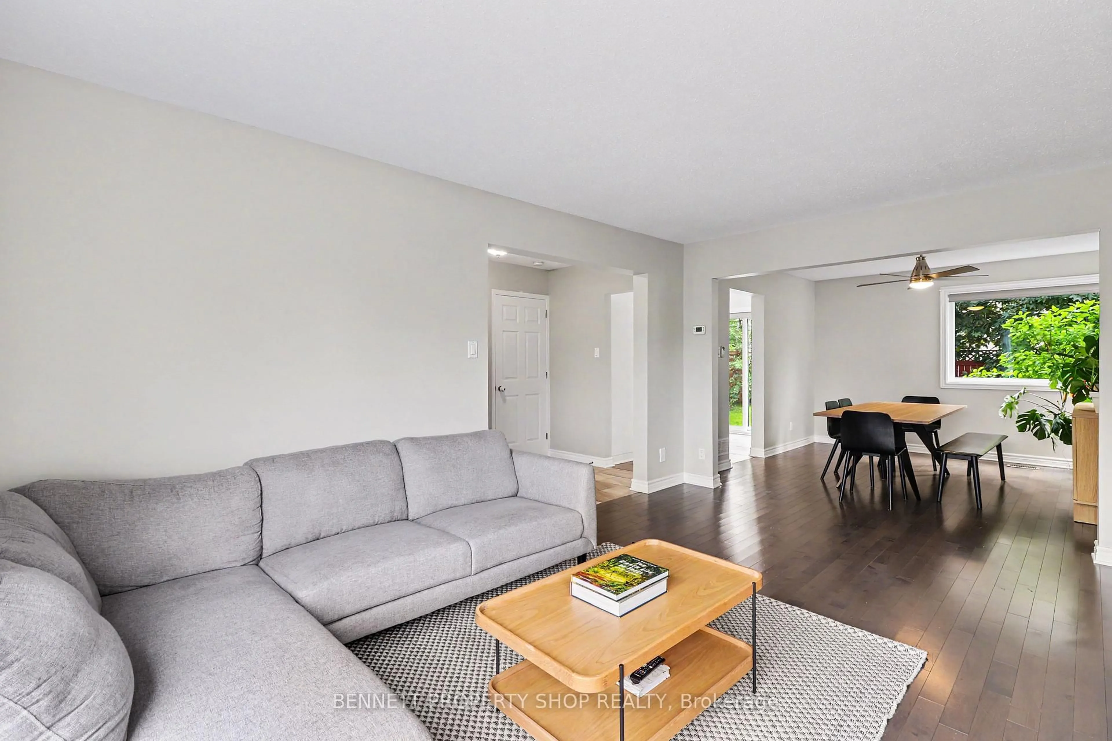 Living room with furniture, wood/laminate floor for 1474 Delia Cres, Orleans Ontario K4A 2Y2