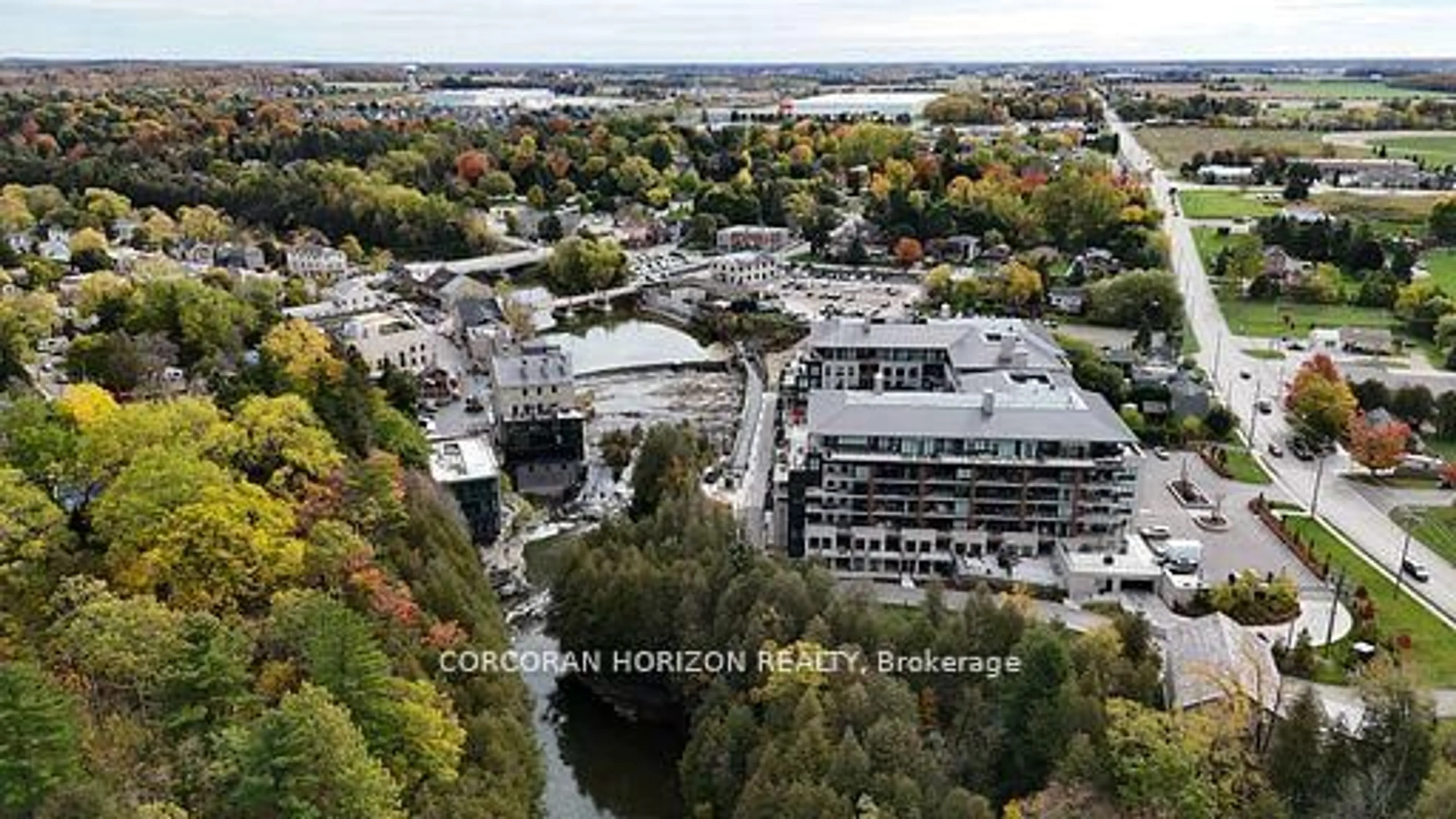 A pic from outside/outdoor area/front of a property/back of a property/a pic from drone, city buildings view from balcony for 6523 Wellington 7 Rd #109, Centre Wellington Ontario N0B 1S0