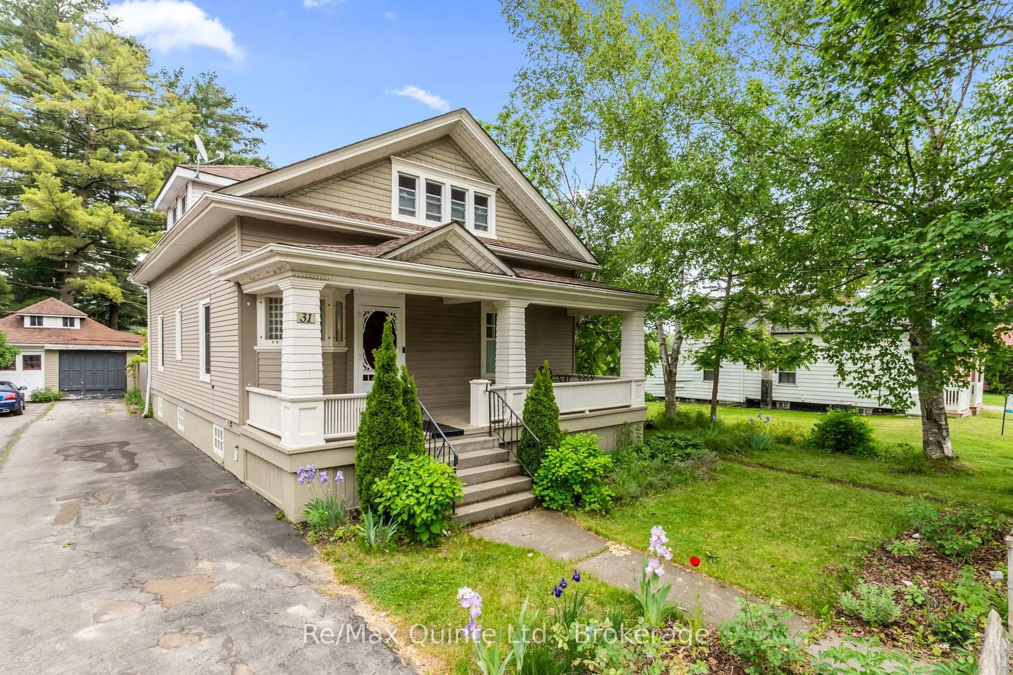 Home with vinyl exterior material, street for 31 Young St, Brighton Ontario K0K 1H0