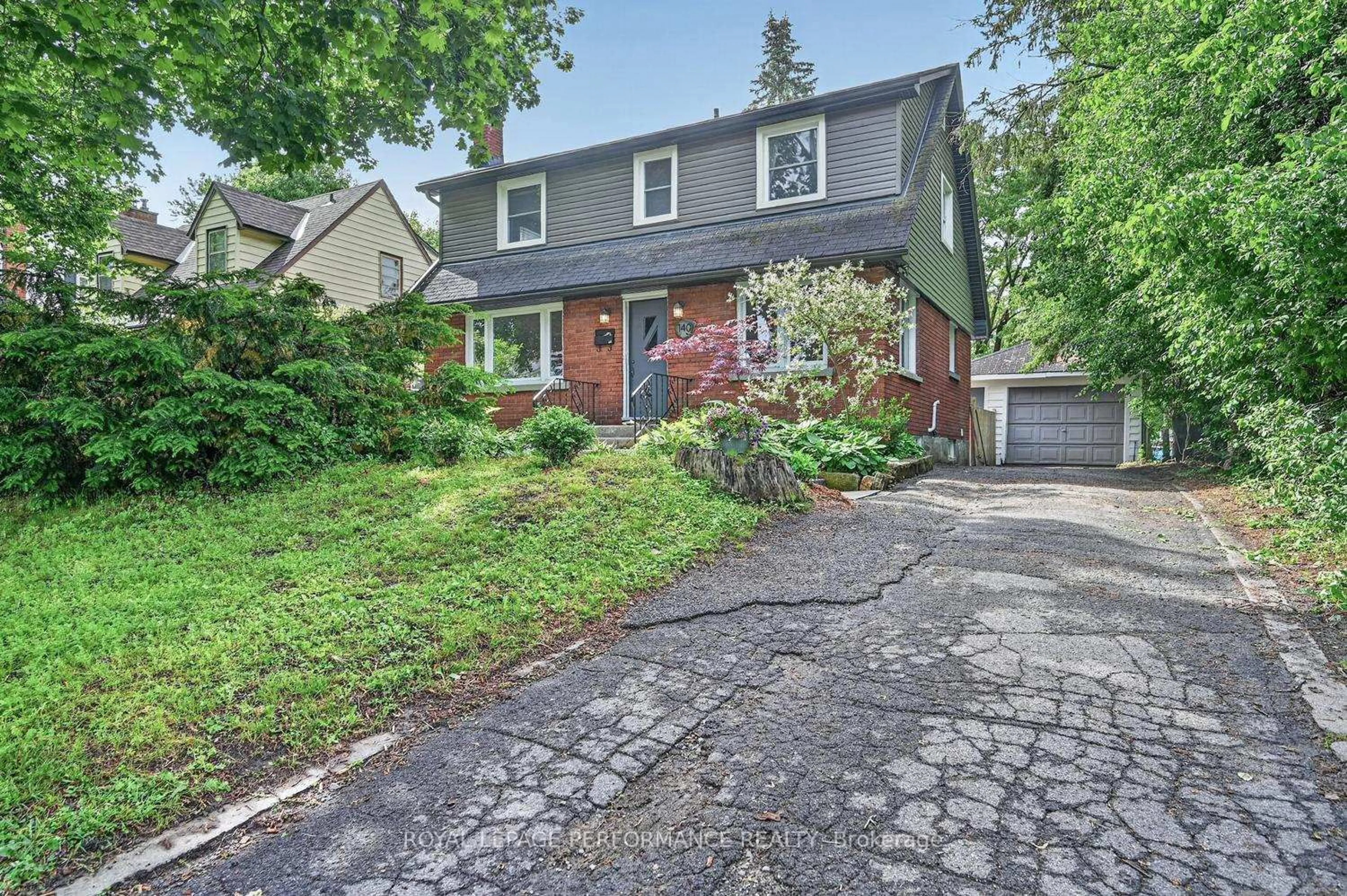 Home with brick exterior material, street for 140 Begonia Ave, Ottawa Ontario K1H 6E4