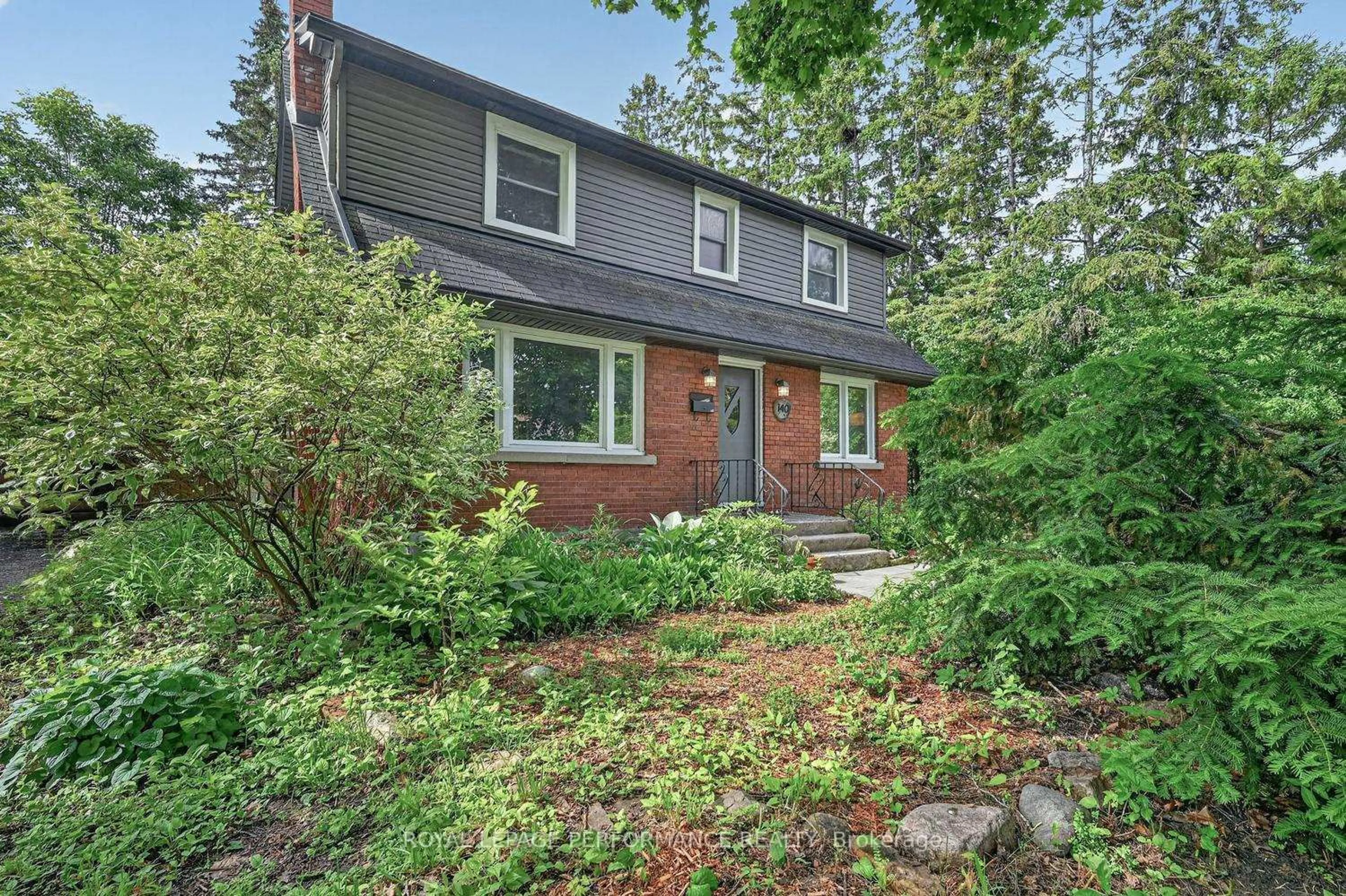 Home with brick exterior material, street for 140 Begonia Ave, Ottawa Ontario K1H 6E4