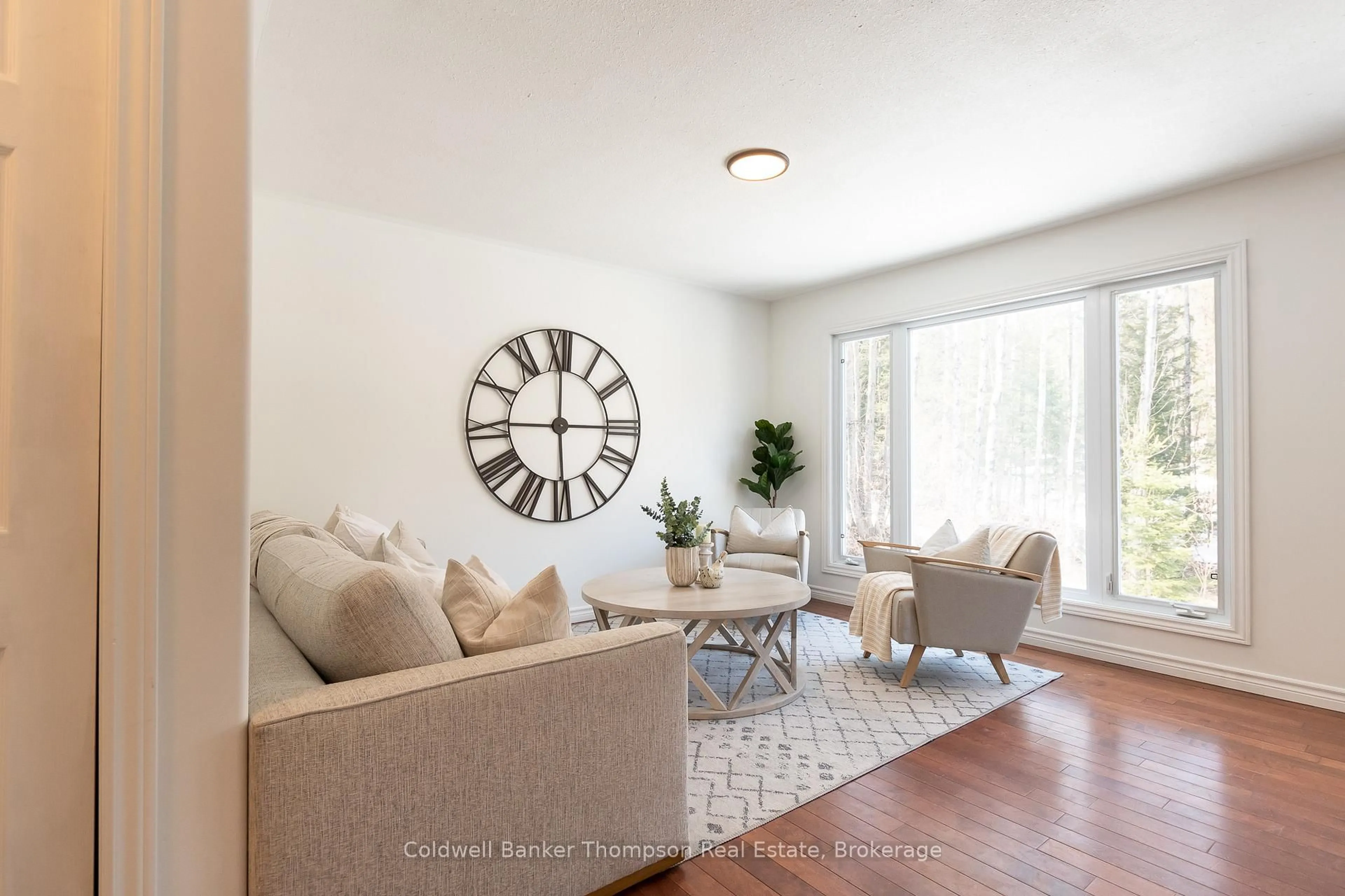 Living room with furniture, unknown for 134 Chaffey Township Rd, Huntsville Ontario P1H 1C8