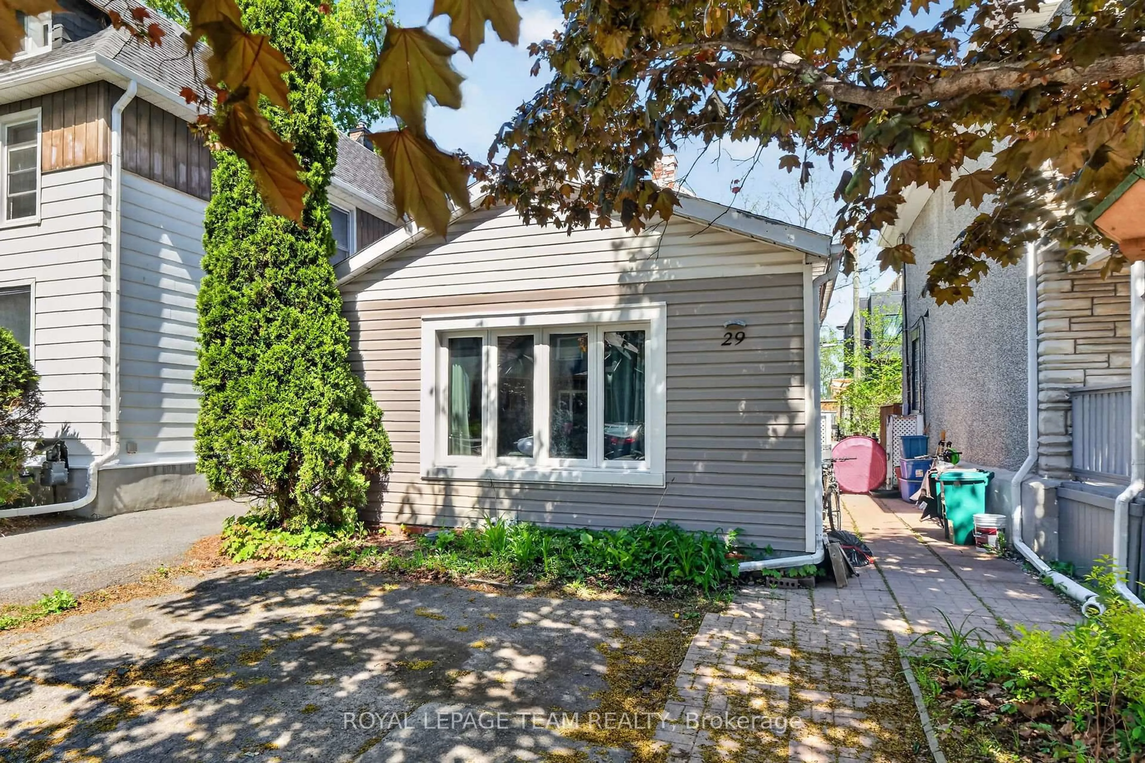 Home with vinyl exterior material, street for 29 Stevenson Ave, Ottawa Ontario K1Z 6M9