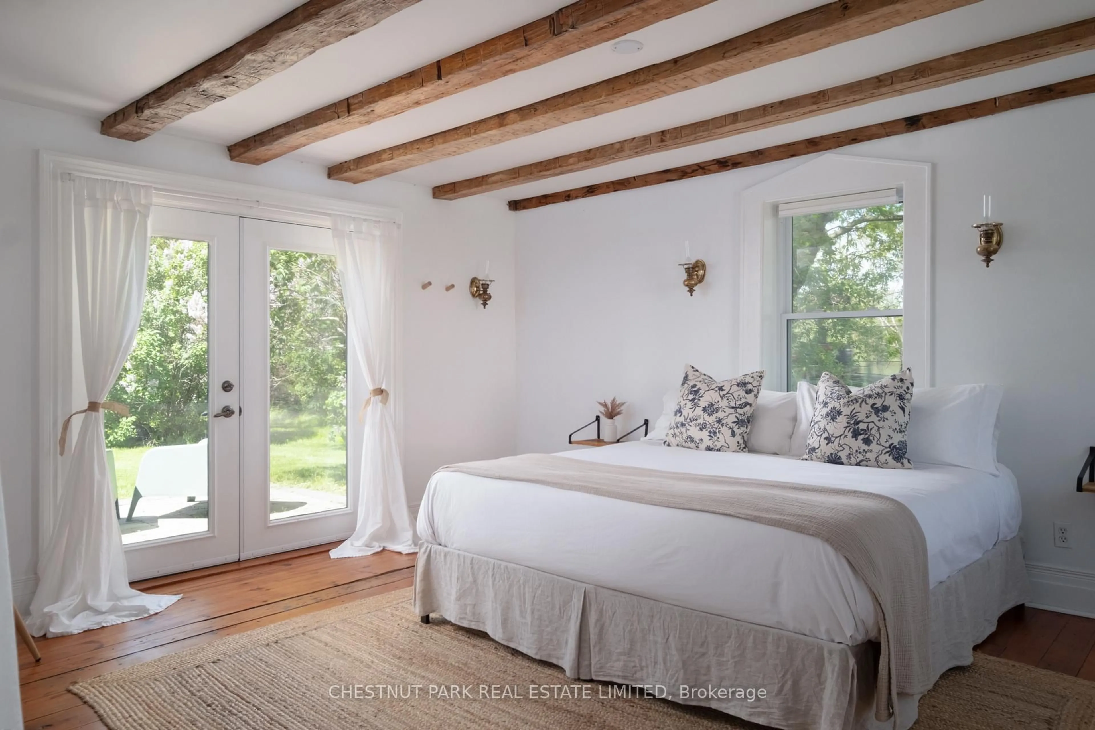Bedroom with bed, wood/laminate floor for 1334 Kelly Rd, Prince Edward County Ontario K0K 1P0