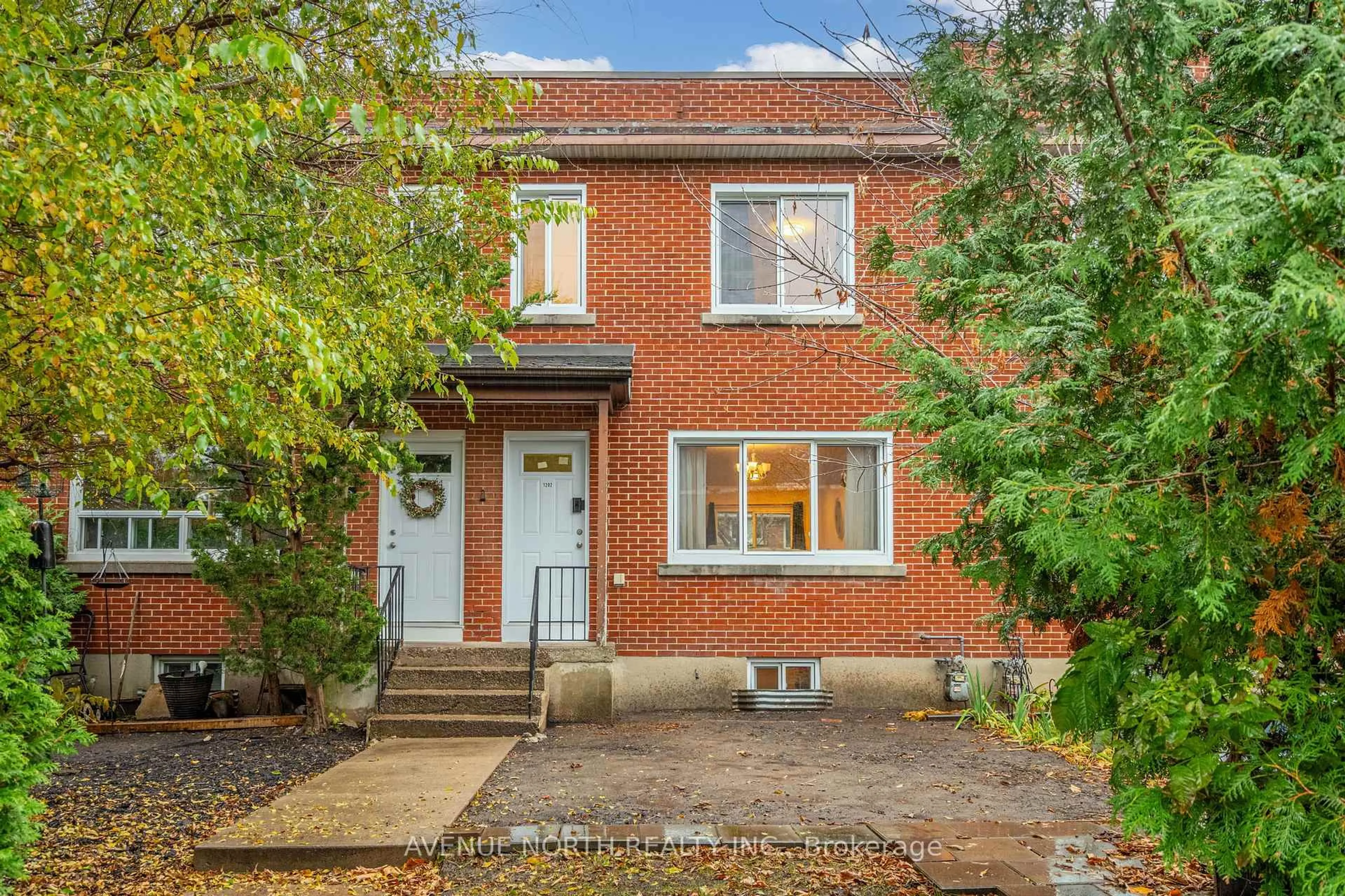 Home with brick exterior material, street for 1202 Summerville Ave, Ottawa Ontario K1Z 8G4