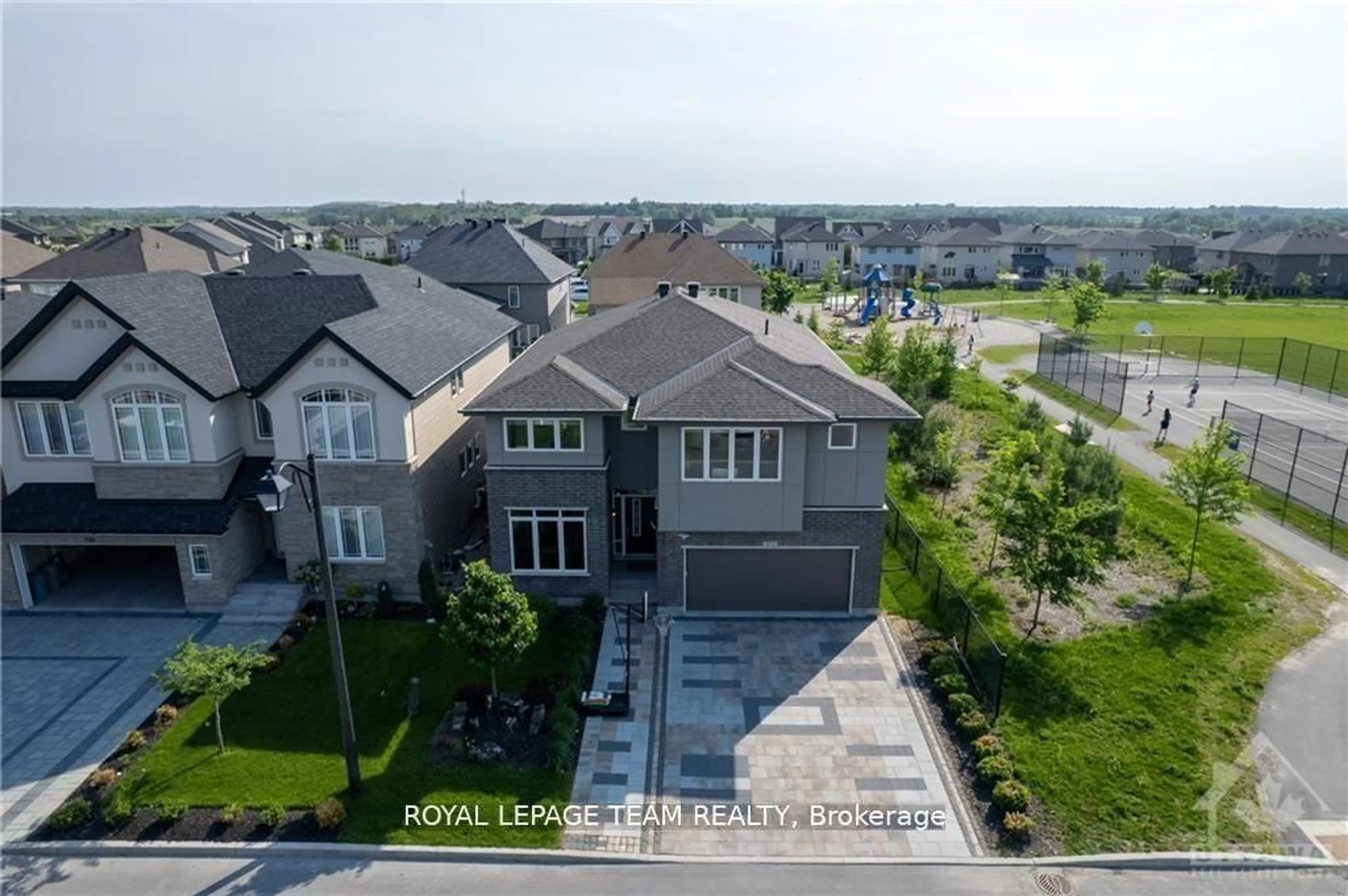 A pic from outside/outdoor area/front of a property/back of a property/a pic from drone, street for 512 BRECCIA Hts, Ottawa Ontario K2T 0L6