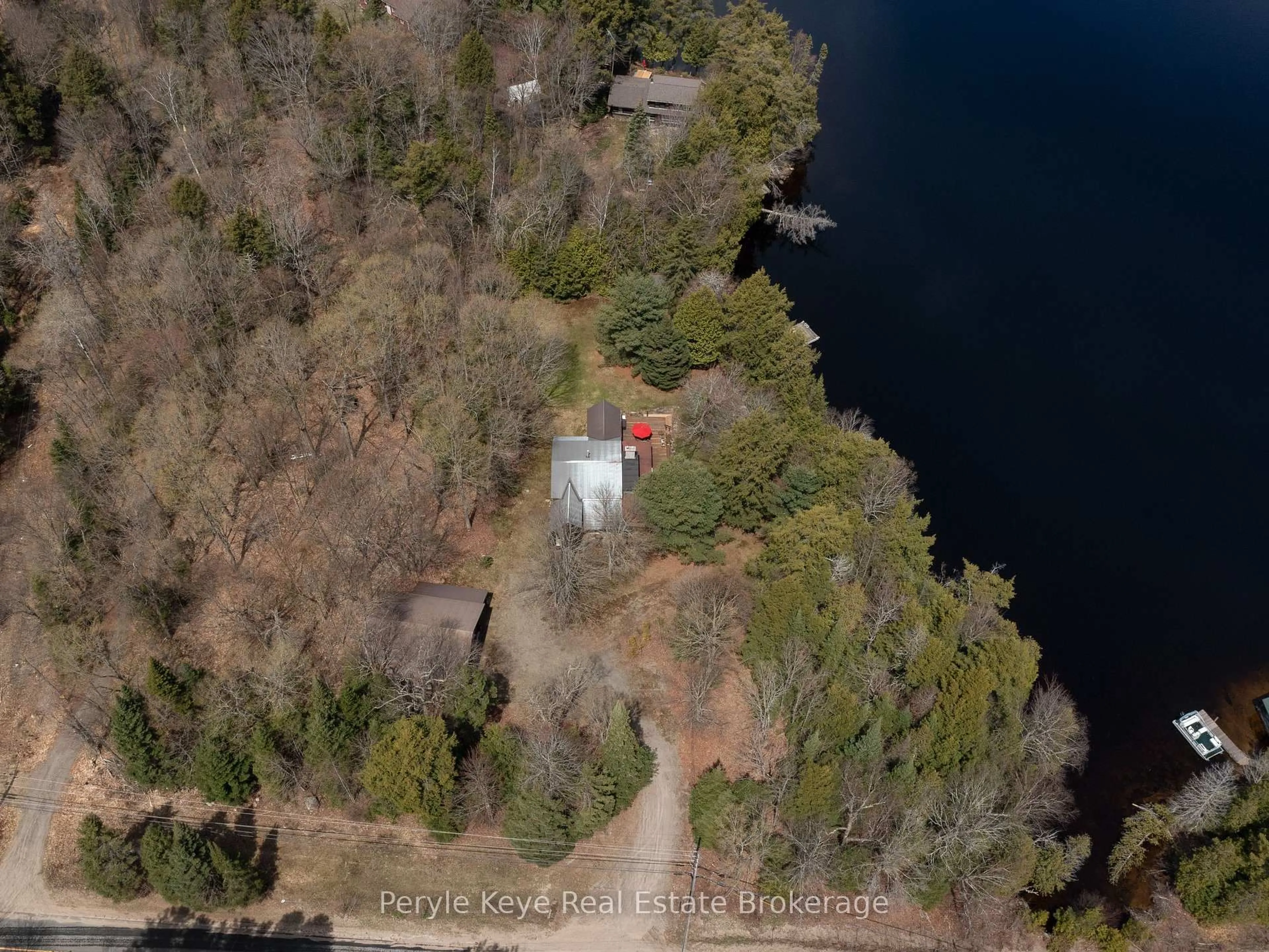 A pic from outside/outdoor area/front of a property/back of a property/a pic from drone, water/lake/river/ocean view for 2391 Limberlost Rd, Lake of Bays Ontario P1H 2J6
