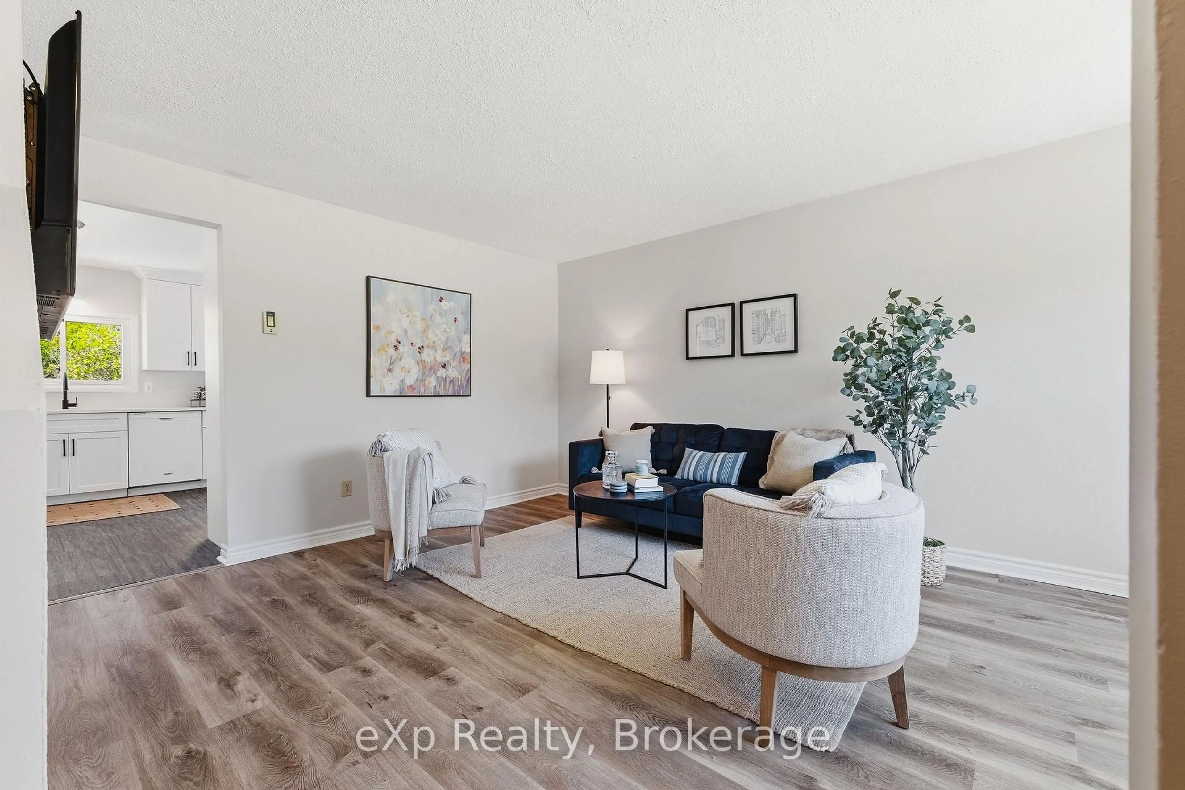 Living room with furniture, wood/laminate floor for 283 Cole Rd, Guelph Ontario N1G 3K1