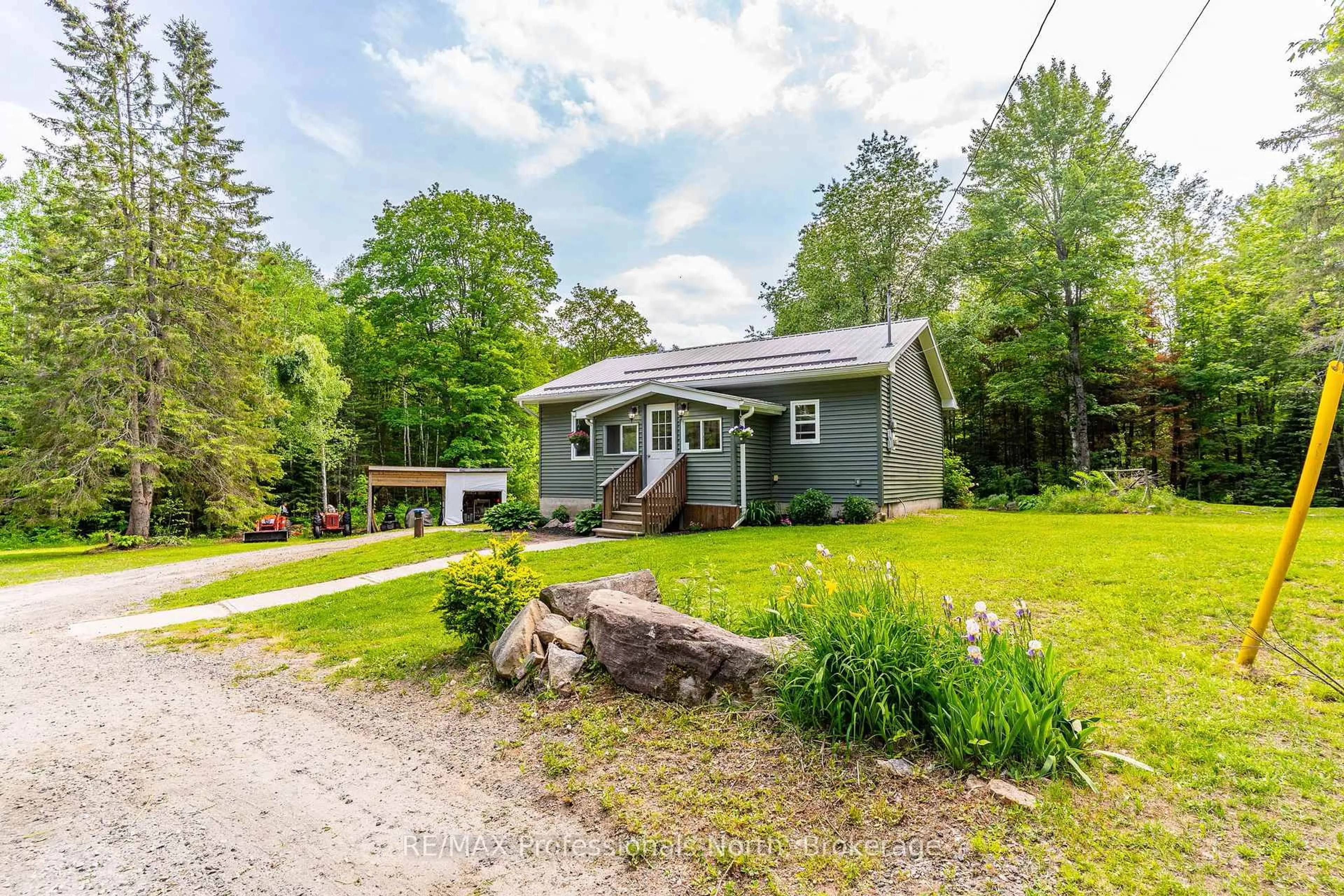 A pic from outside/outdoor area/front of a property/back of a property/a pic from drone, street for 17900 Highway 118, Highlands East Ontario K0L 2Y0