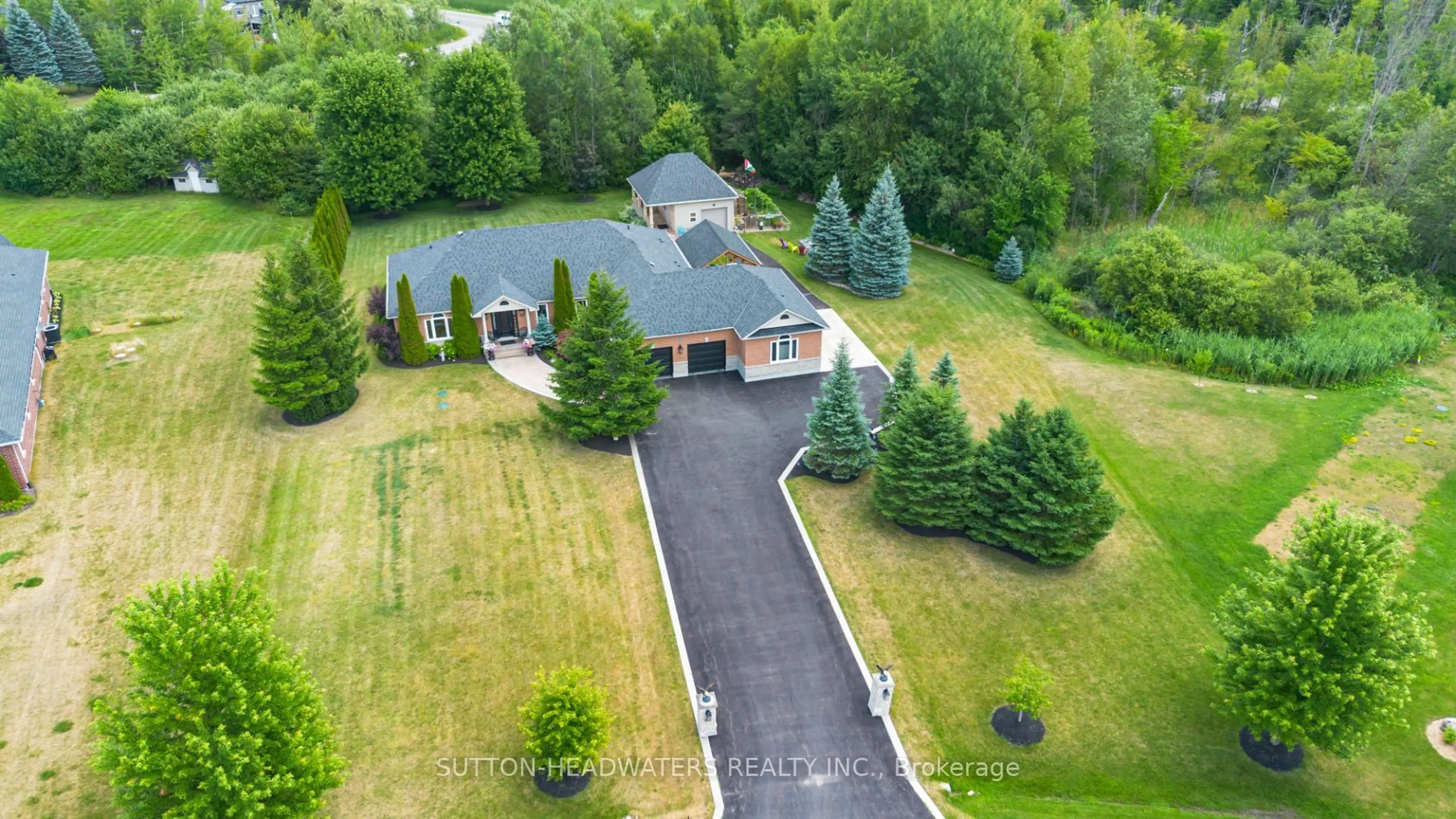 A pic from outside/outdoor area/front of a property/back of a property/a pic from drone, unknown for 63 Brookhaven Cres, East Garafraxa Ontario L9W 2Y9