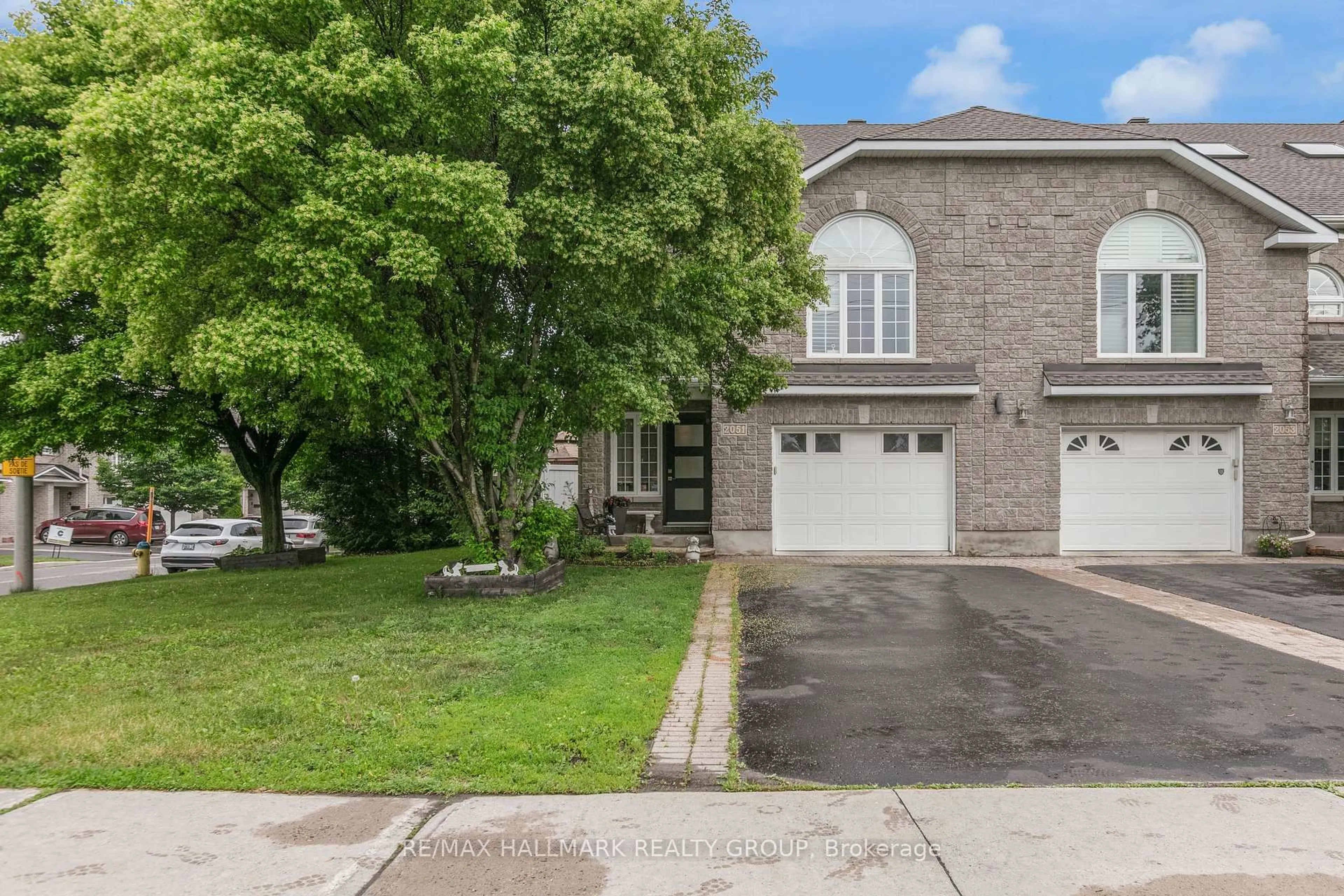 A pic from outside/outdoor area/front of a property/back of a property/a pic from drone, street for 2051 Frank Bender St, Ottawa Ontario K1C 1M7