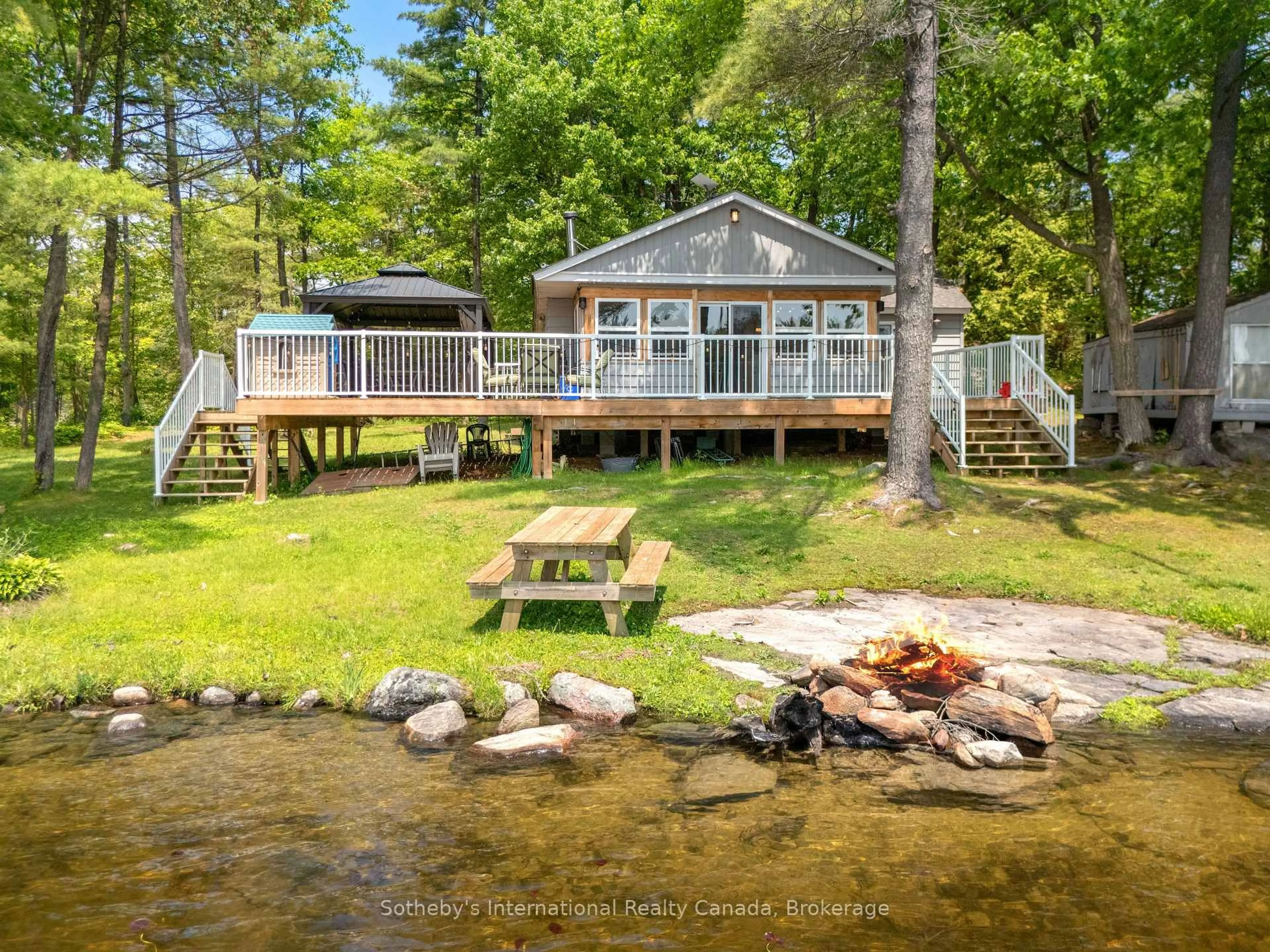 A pic from outside/outdoor area/front of a property/back of a property/a pic from drone, water/lake/river/ocean view for 4 Is 40 Go Home Lake, Georgian Bay Ontario P0C 1H0