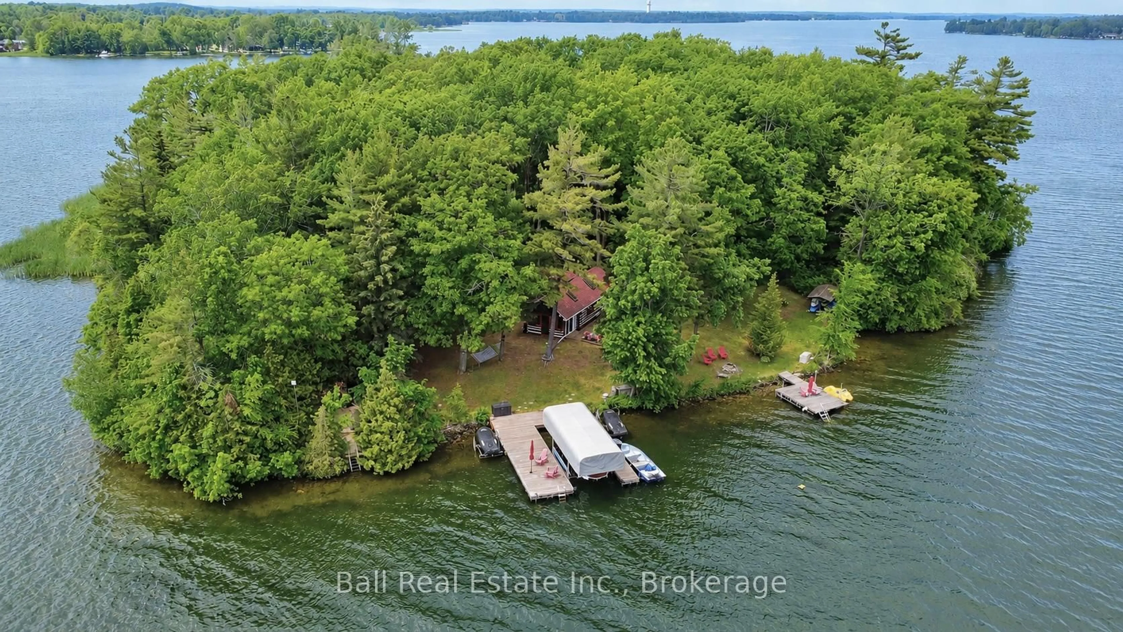A pic from outside/outdoor area/front of a property/back of a property/a pic from drone, water/lake/river/ocean view for 927 Kelly Island, Selwyn Ontario K0L 1H0