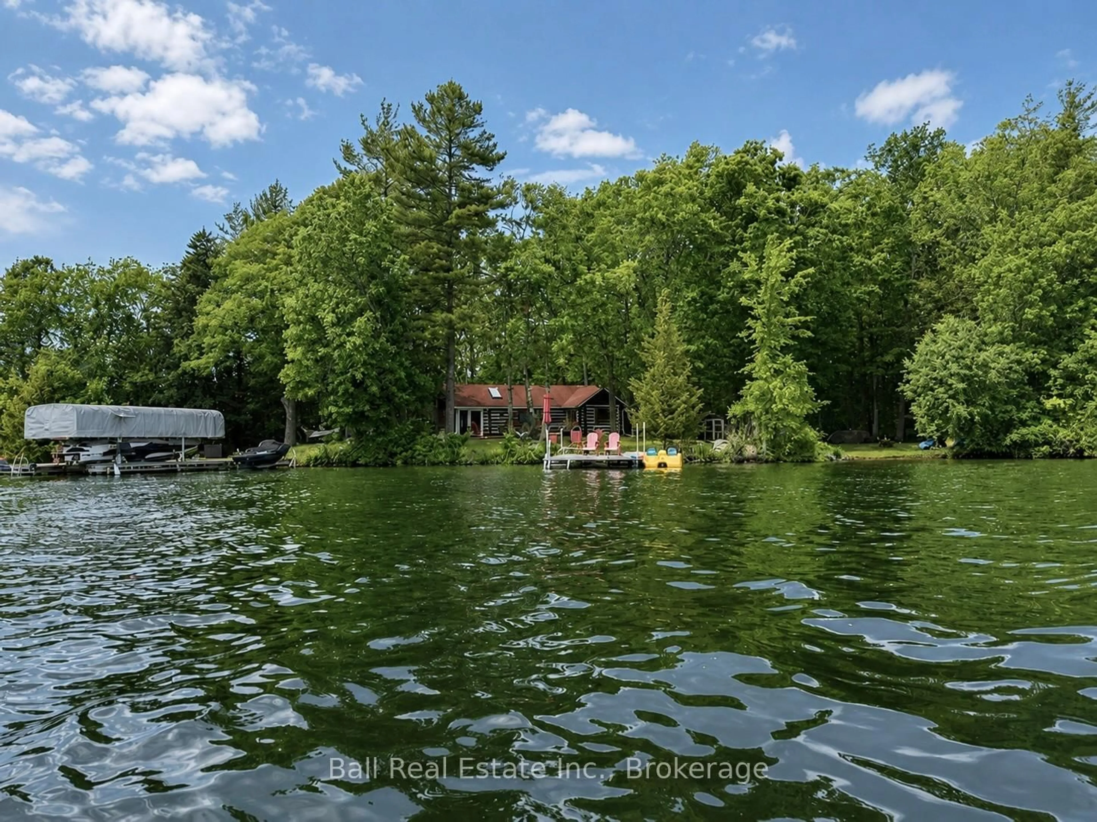 A pic from outside/outdoor area/front of a property/back of a property/a pic from drone, water/lake/river/ocean view for 927 Kelly Island, Selwyn Ontario K0L 1H0
