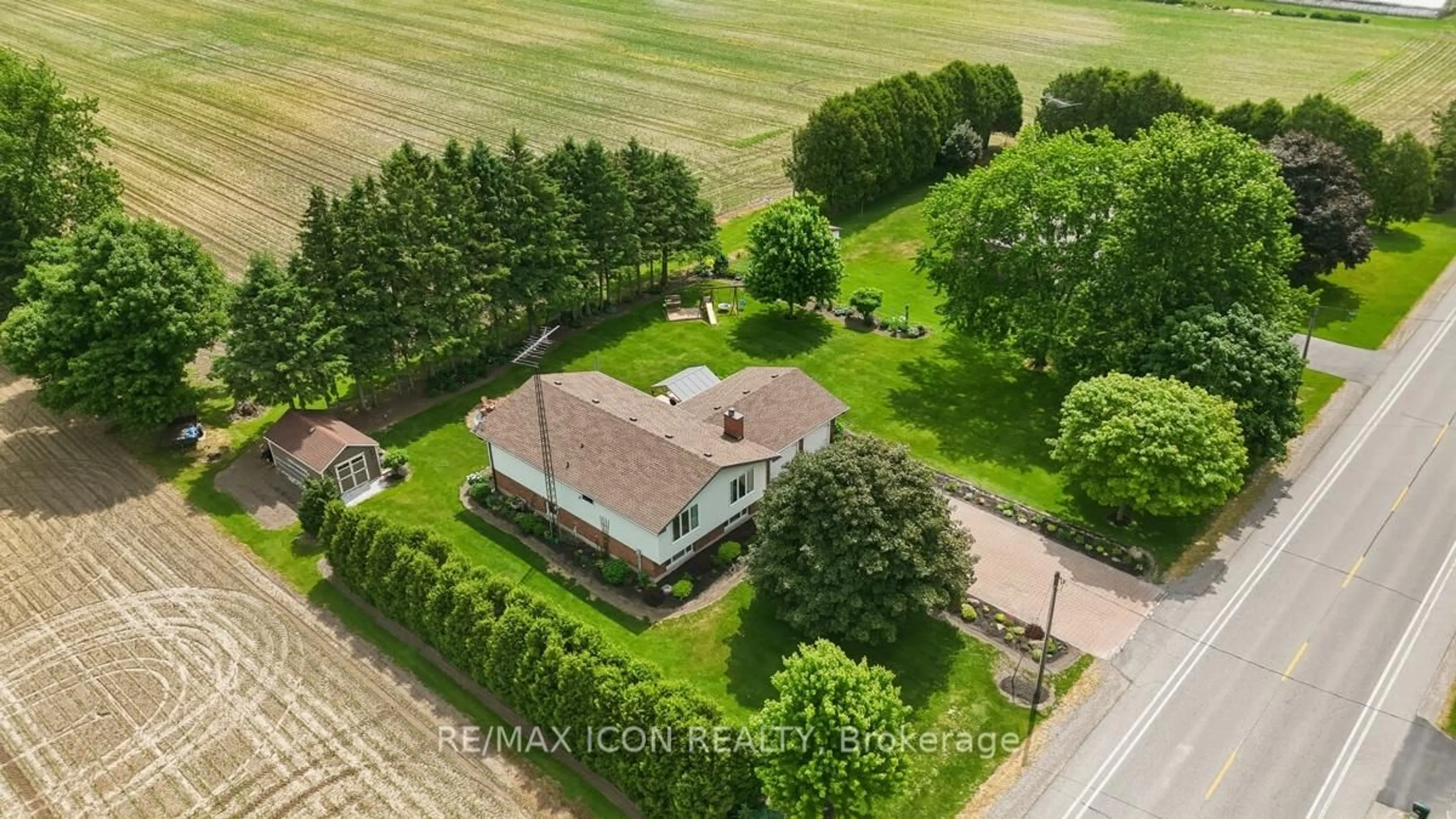 A pic from outside/outdoor area/front of a property/back of a property/a pic from drone, street for 10810 Graham Rd, West Elgin Ontario N0L 2P0