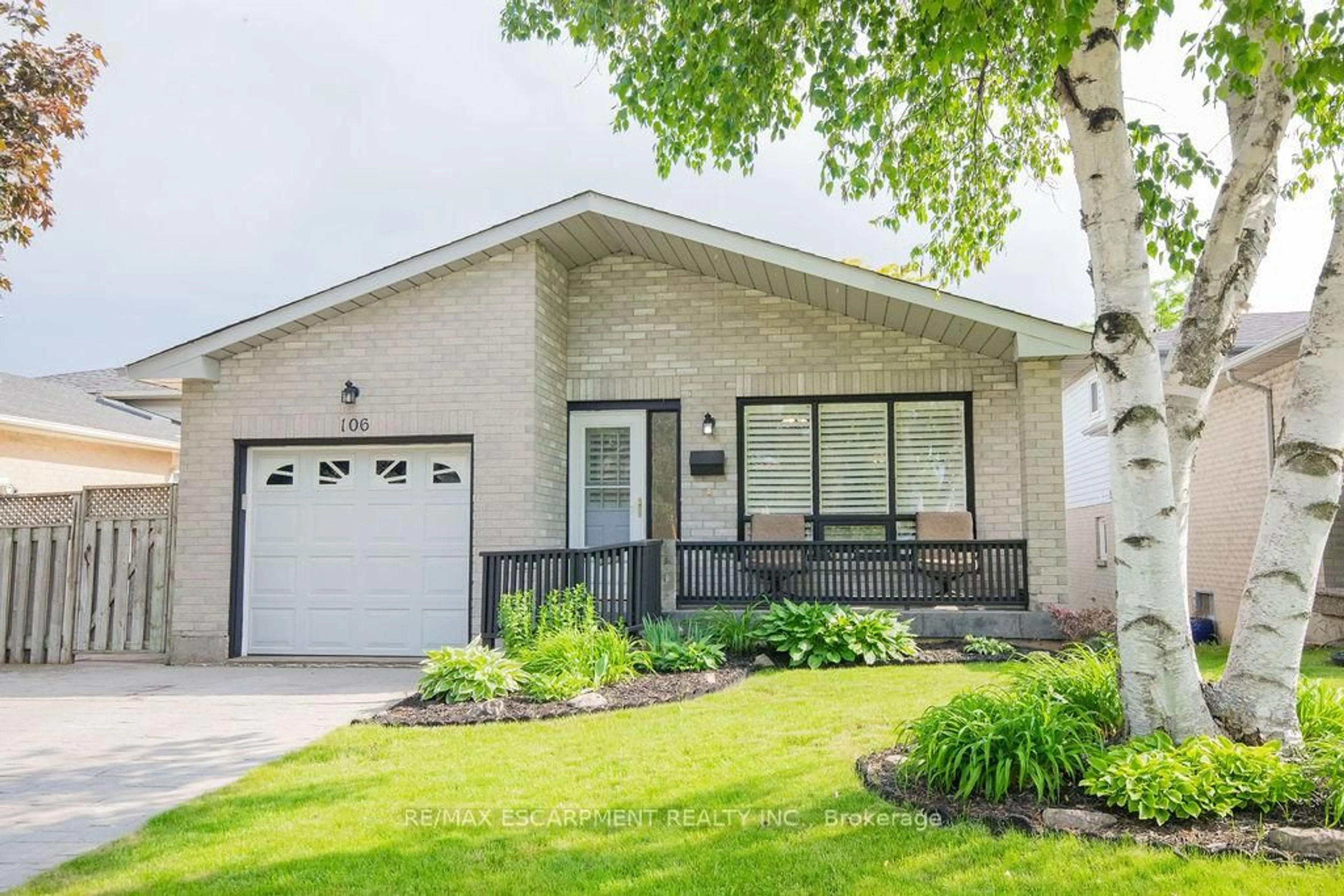 Home with brick exterior material, street for 106 Ossington Dr, Hamilton Ontario L8W 3S5